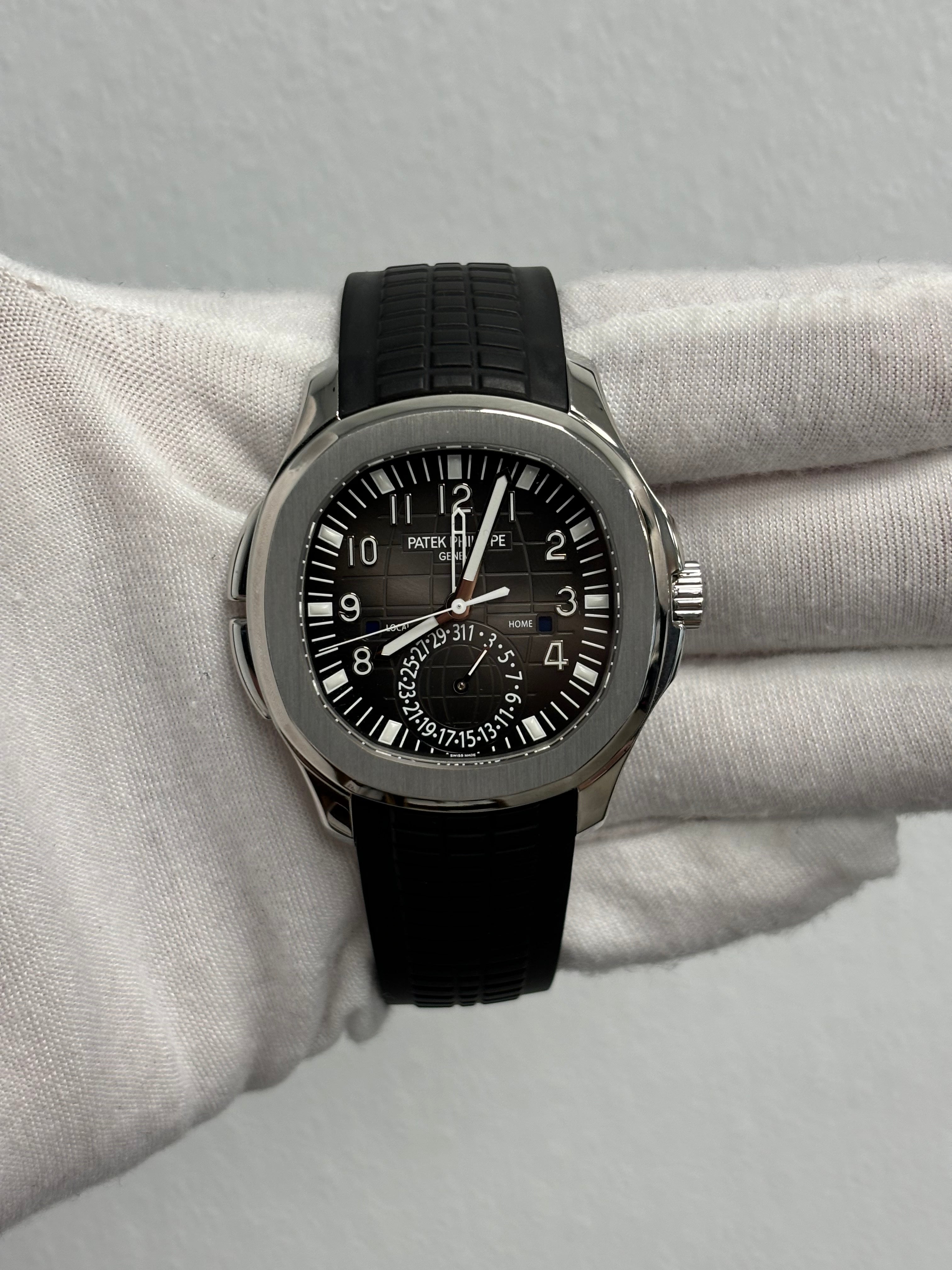Patek Philippe Aquanaut Travel Time Stainless Steel 40mm Black Arabic Dial Watch Reference# 5164A-001 - Happy Jewelers Fine Jewelry Lifetime Warranty