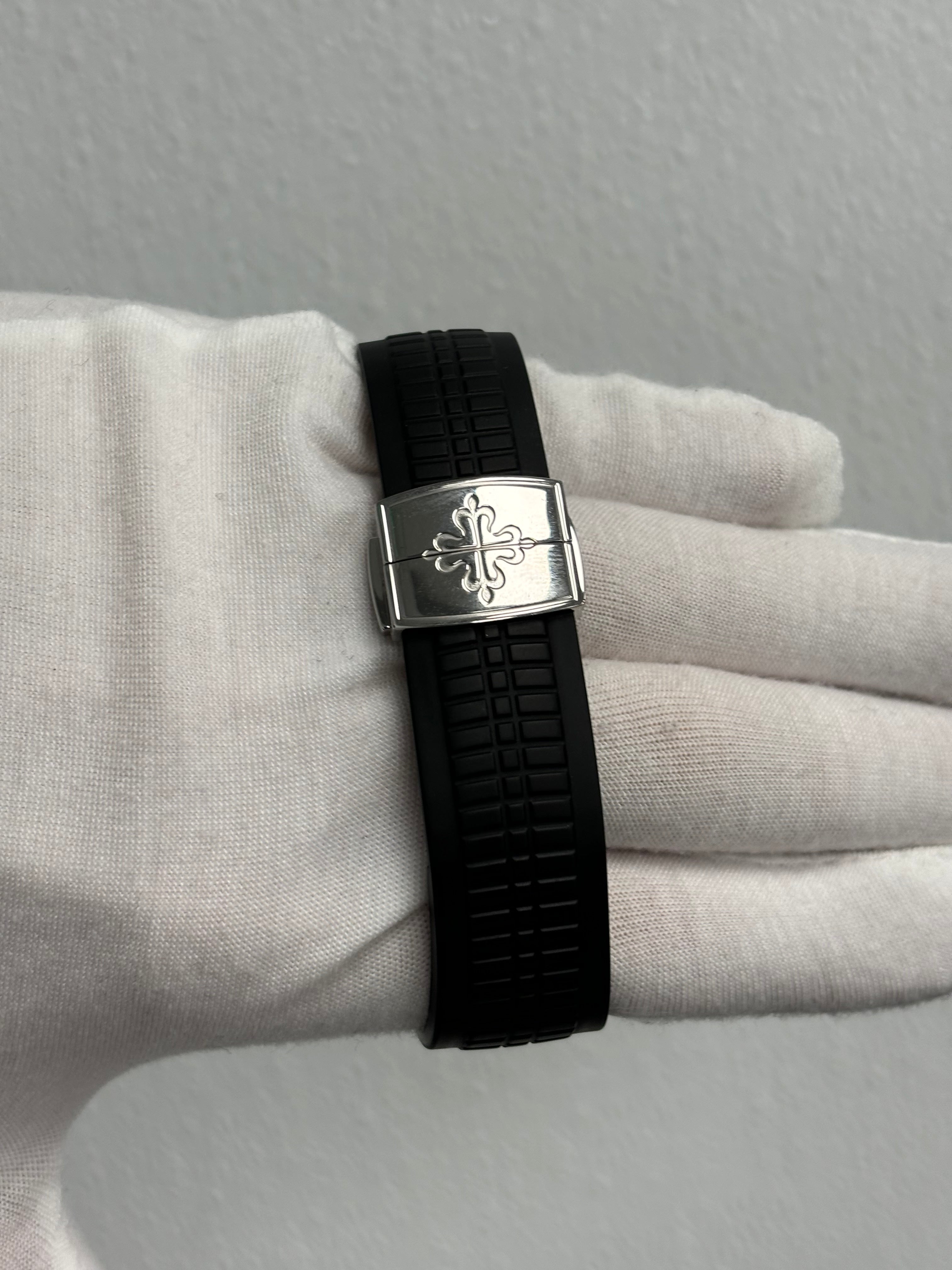 Patek Philippe Aquanaut Travel Time Stainless Steel 40mm Black Arabic Dial Watch Reference# 5164A-001 - Happy Jewelers Fine Jewelry Lifetime Warranty