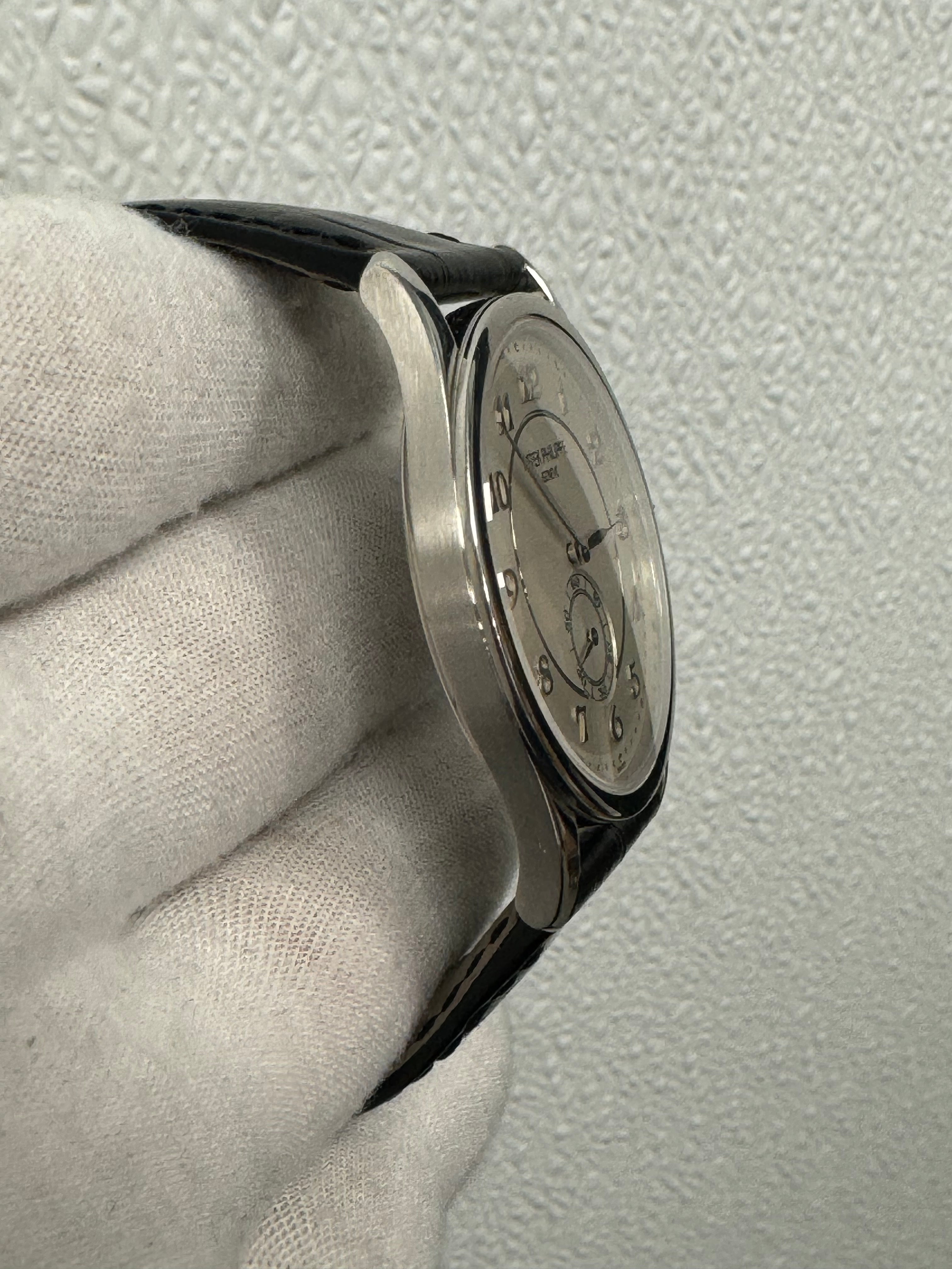 Patek Philippe Calatrava 37mm 950 Platinum Silver Arabic Dial Watch Reference# 5196P-001 - Happy Jewelers Fine Jewelry Lifetime Warranty