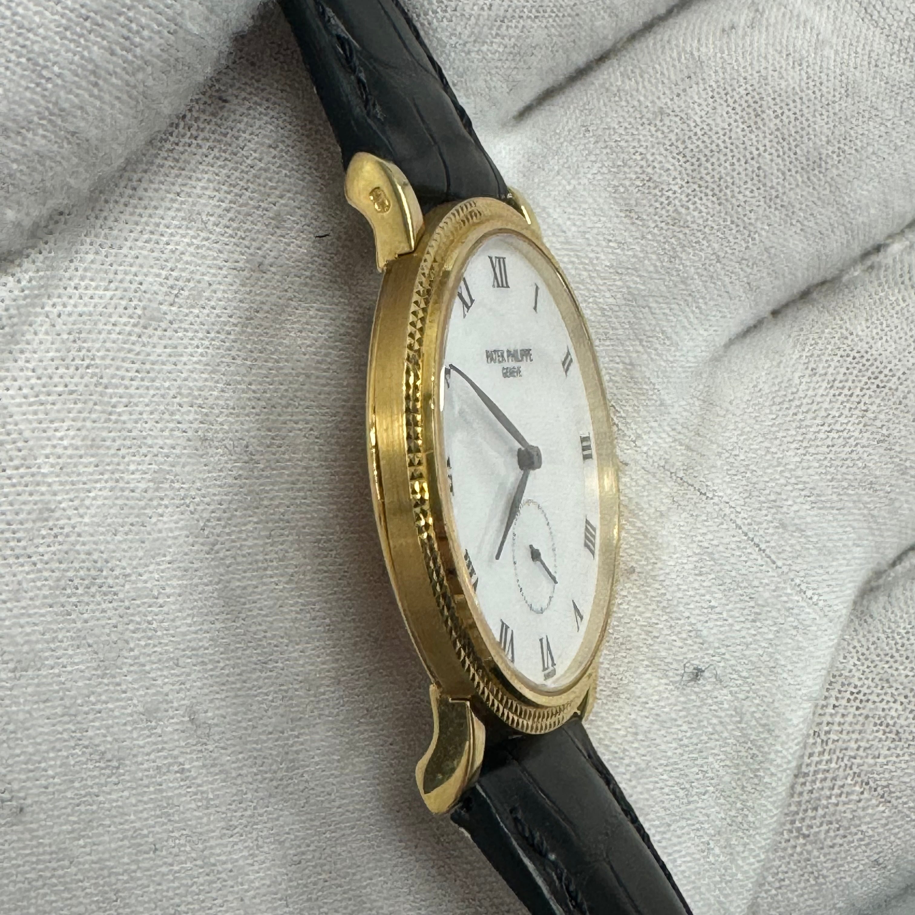 Patek Philippe Calatrava 33.5mm White Dial Ref# 3919 - Happy Jewelers Fine Jewelry Lifetime Warranty