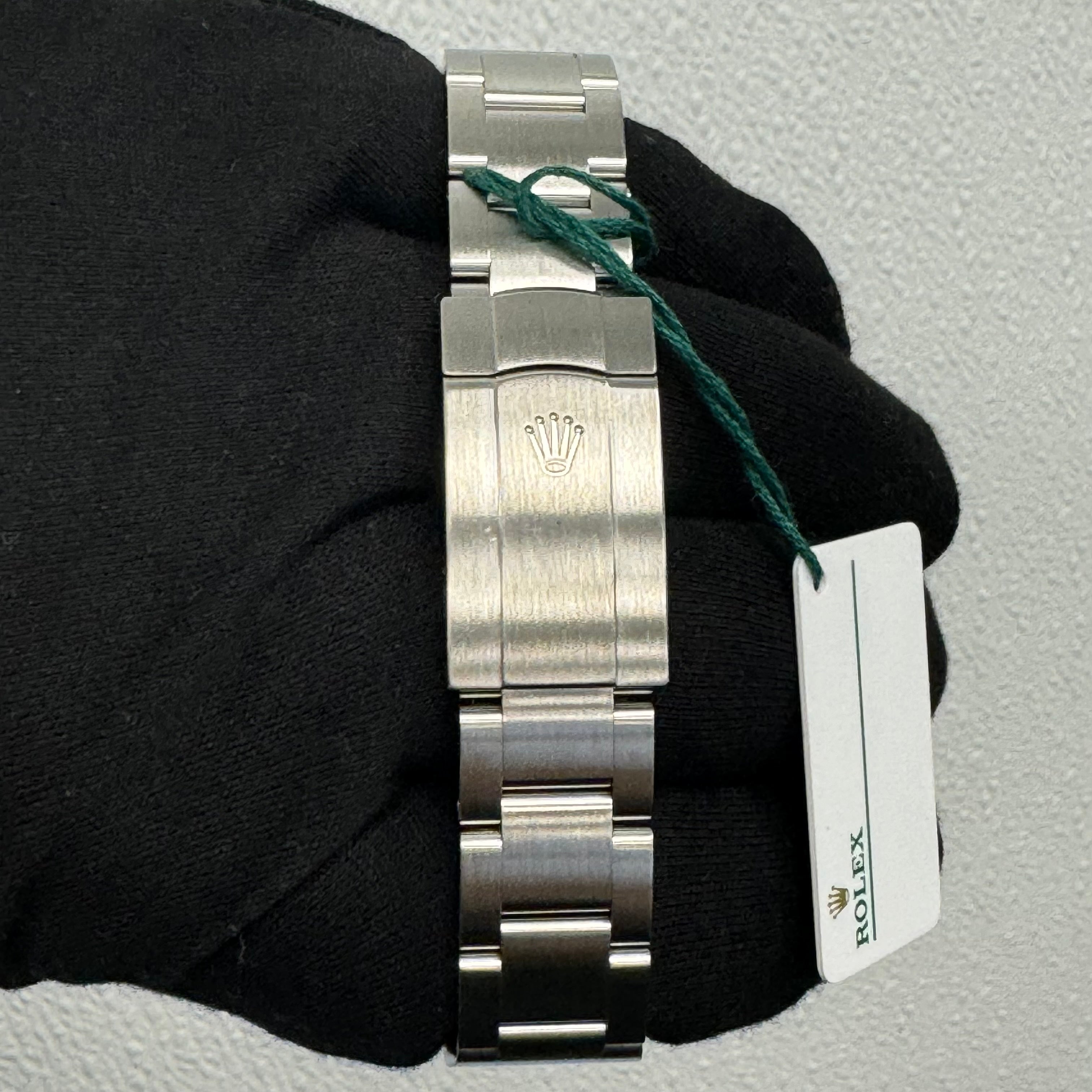 Rolex Oyster Perpetual 41mm Coral Red Dial Watch Ref# 124300 - Happy Jewelers Fine Jewelry Lifetime Warranty