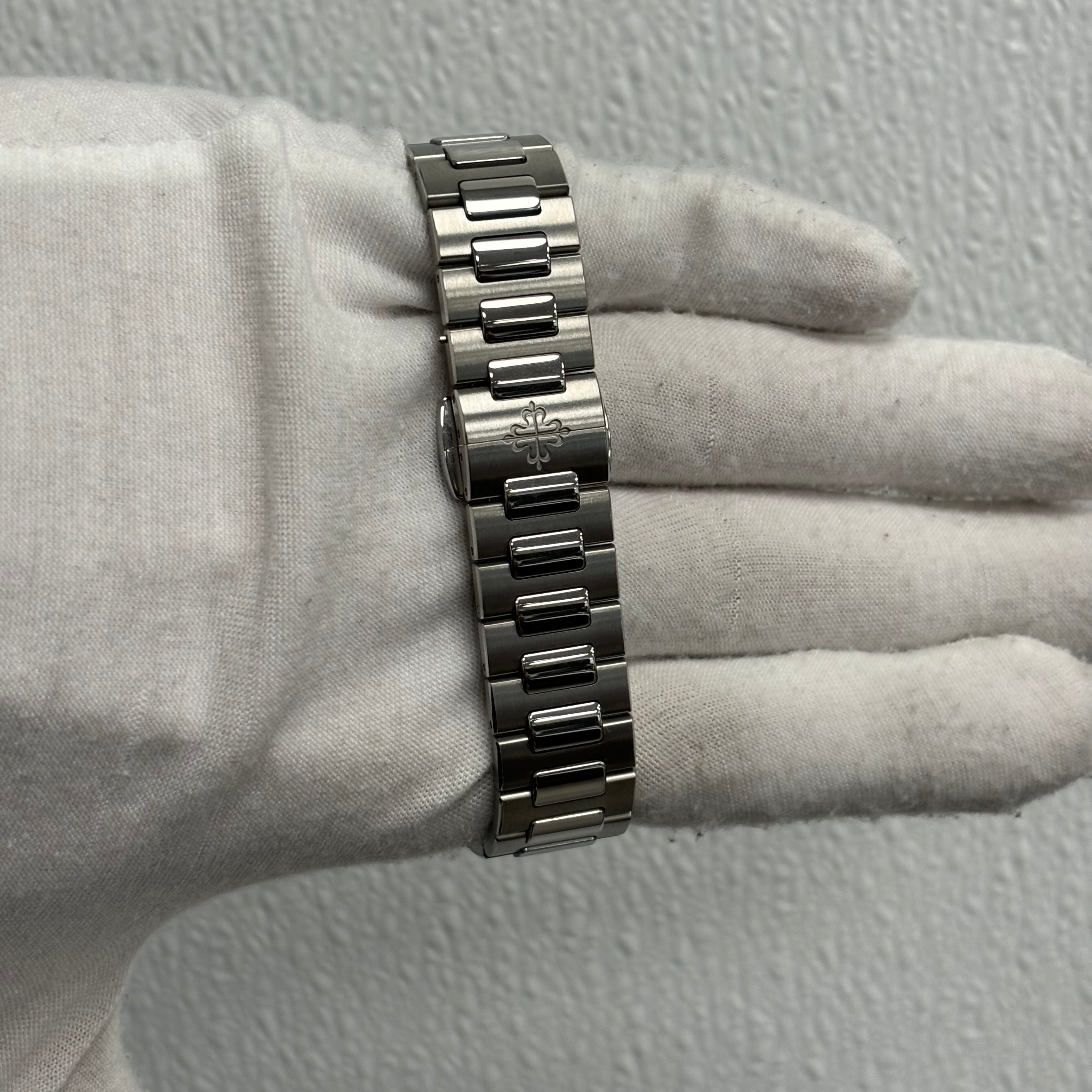 Patek Philippe Lady Nautilus 35.2mm Silver Opaline Dial Watch Ref# 7118/1A-010 - Happy Jewelers Fine Jewelry Lifetime Warranty