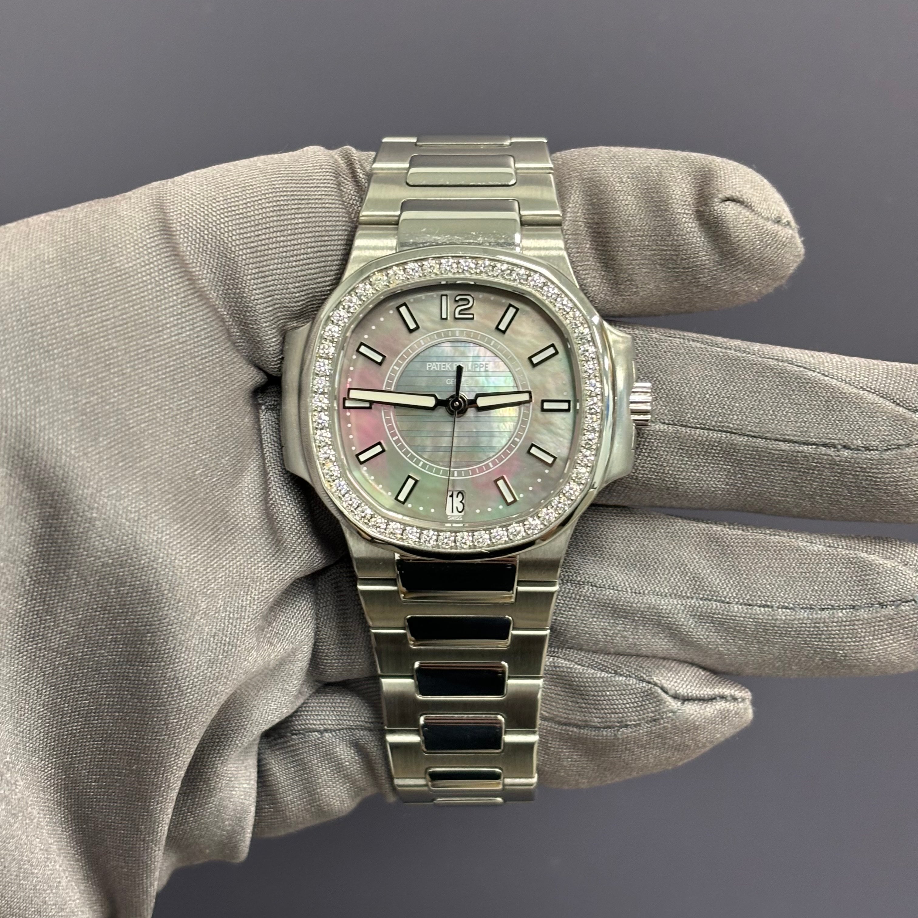 Patek Philippe Nautilus 34mm MOP Dial Watch Ref# 7008/1A-012 - Happy Jewelers Fine Jewelry Lifetime Warranty