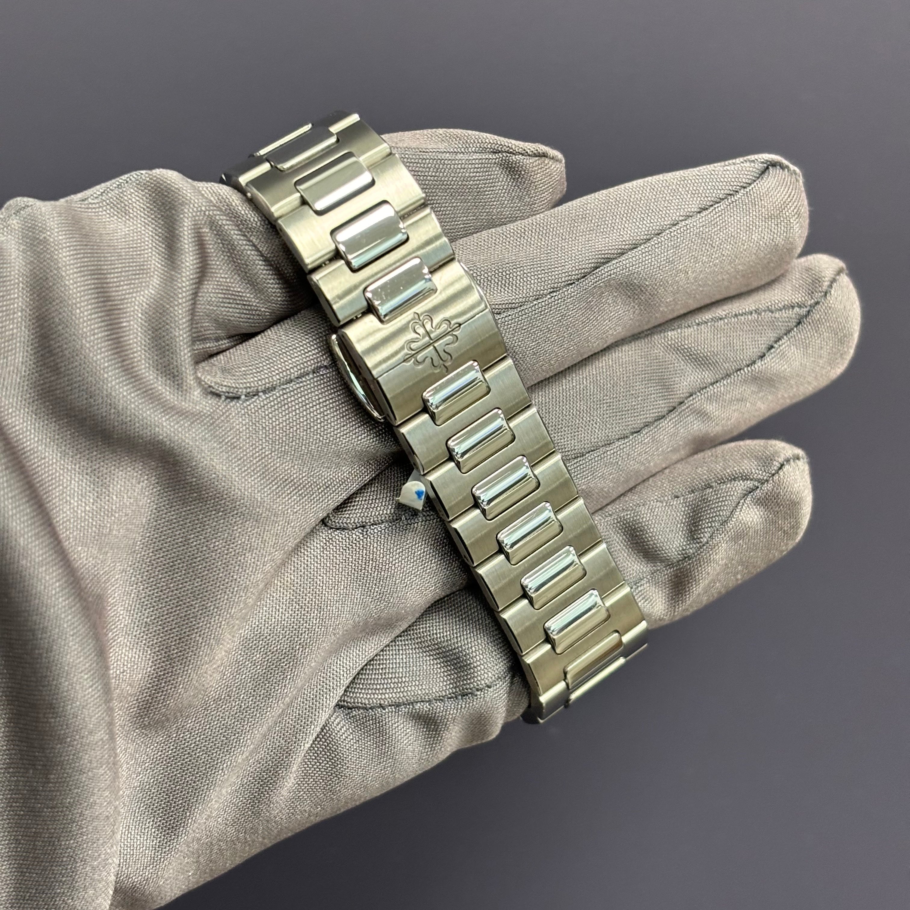 Patek Philippe Nautilus 34mm MOP Dial Watch Ref# 7008/1A-012 - Happy Jewelers Fine Jewelry Lifetime Warranty