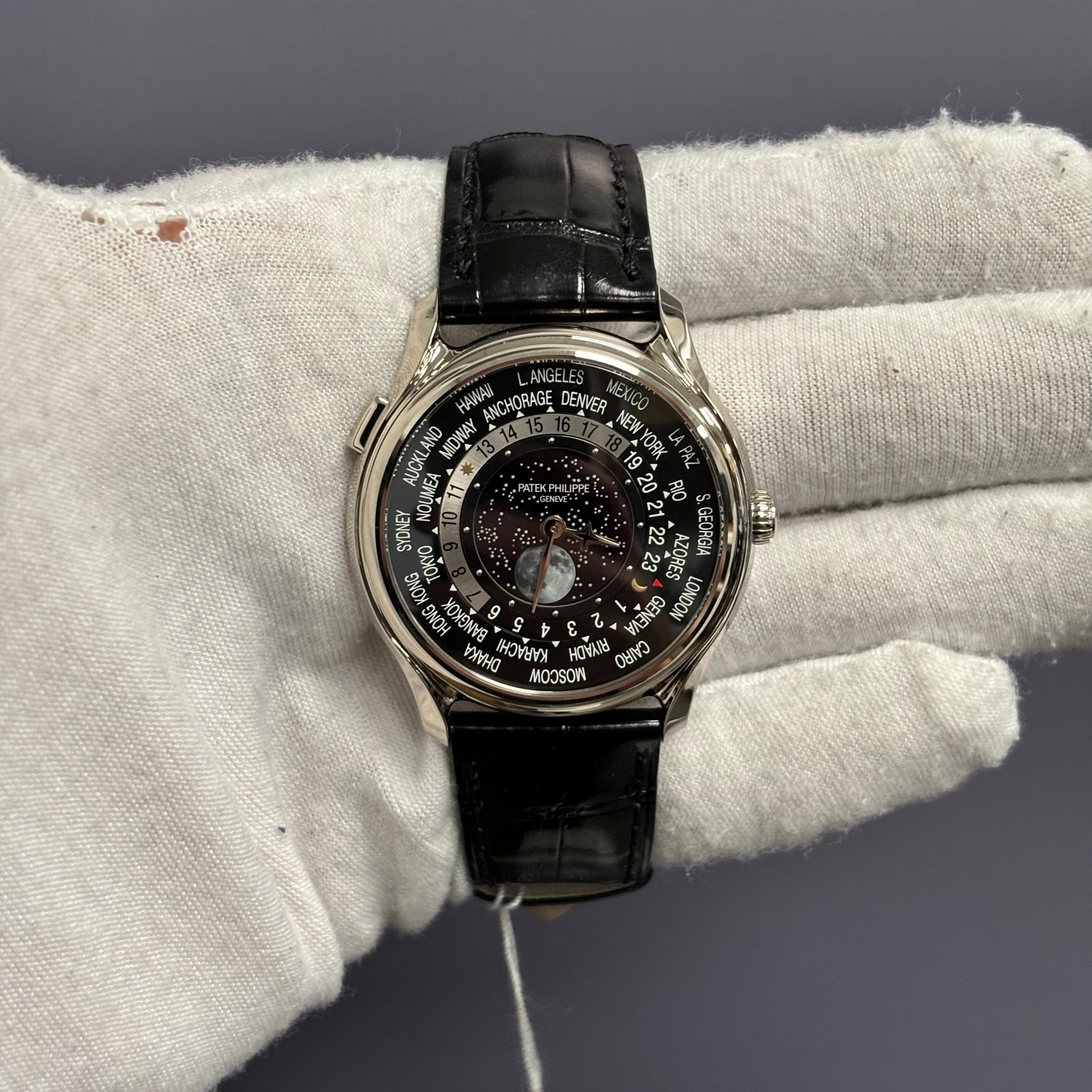 Patek Philippe World Time 40mm Black Dial Watch Ref# 5575G-001 - Happy Jewelers Fine Jewelry Lifetime Warranty