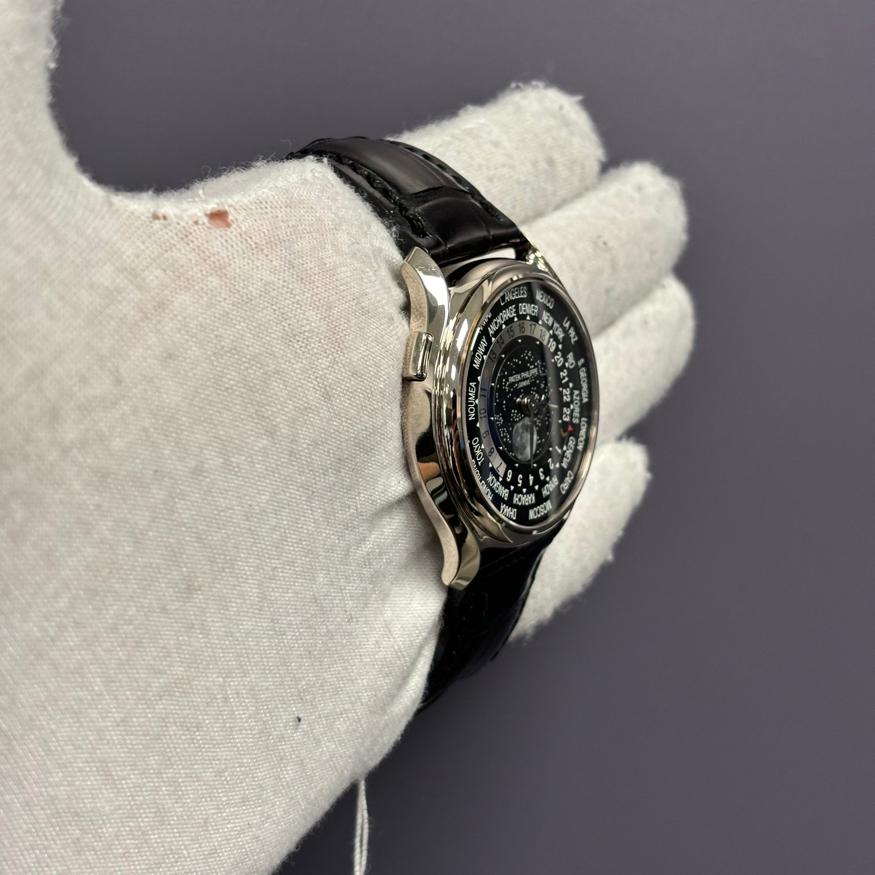 Patek Philippe World Time 40mm Black Dial Watch Ref# 5575G-001 - Happy Jewelers Fine Jewelry Lifetime Warranty