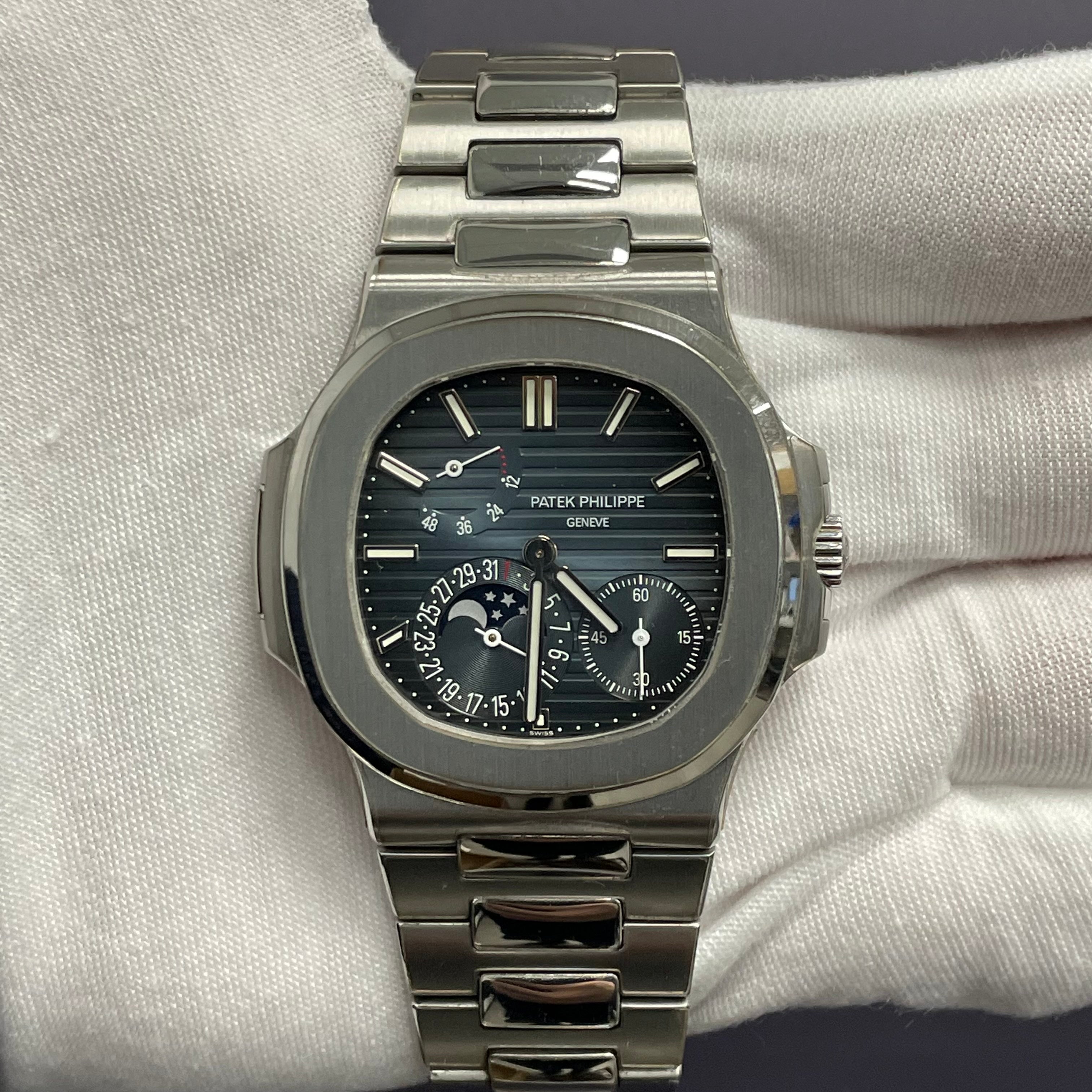 Patek Philippe Nautilus 40.5mm Blue Dial Watch Ref# 5712/1A-001 - Happy Jewelers Fine Jewelry Lifetime Warranty