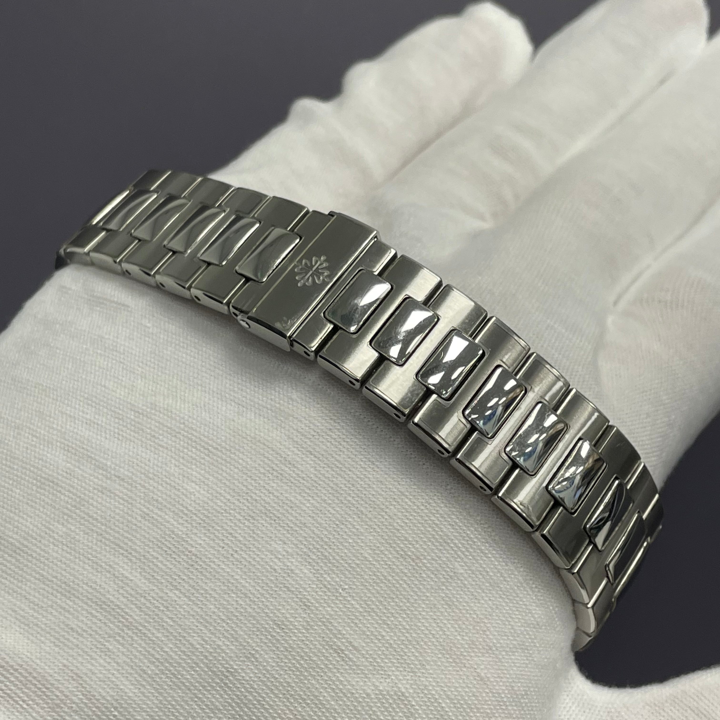 Patek Philippe Nautilus 40.5mm Blue Dial Watch Ref# 5712/1A-001 - Happy Jewelers Fine Jewelry Lifetime Warranty