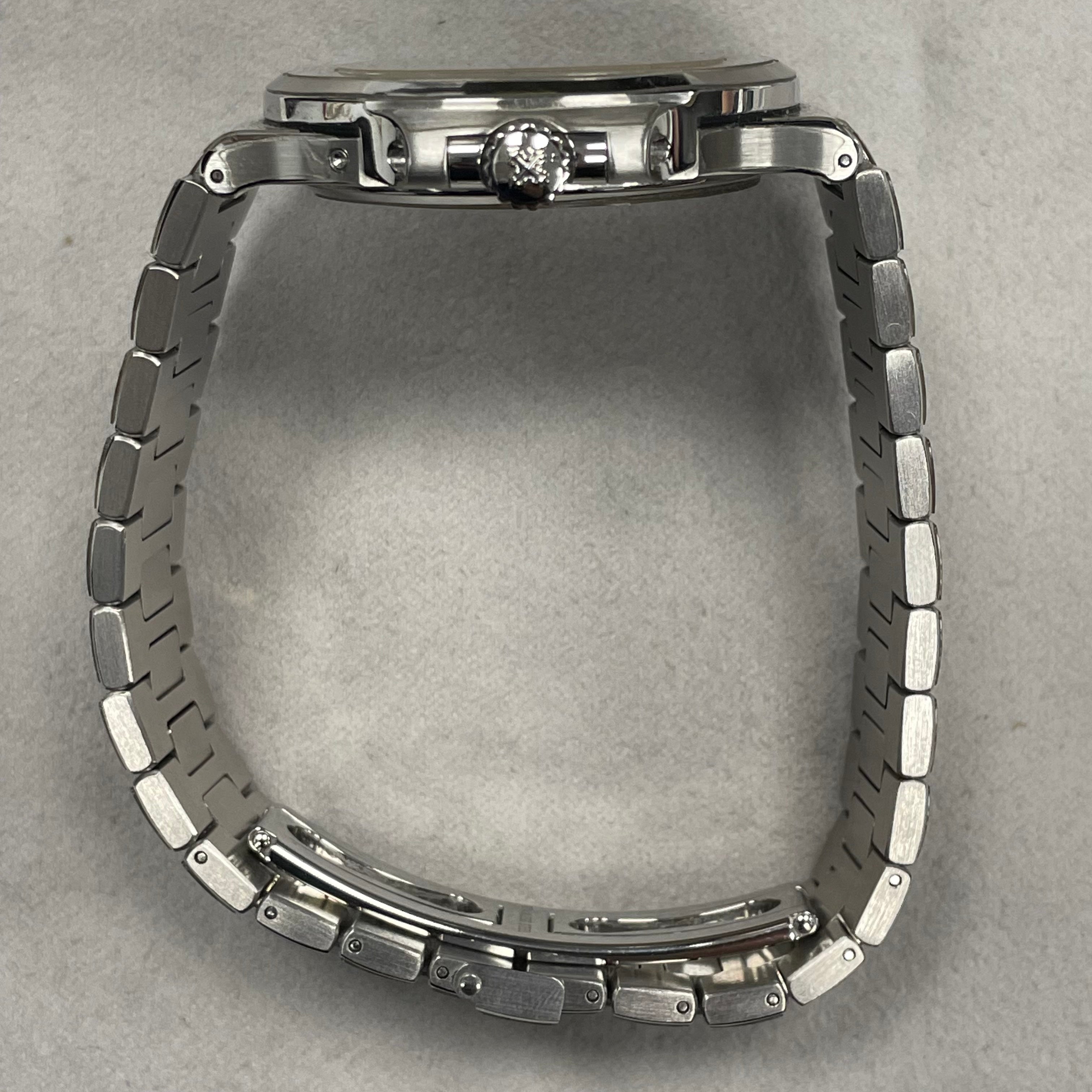 Patek Philippe Nautilus 40.5mm Blue Dial Watch Ref# 5712/1A-001 - Happy Jewelers Fine Jewelry Lifetime Warranty