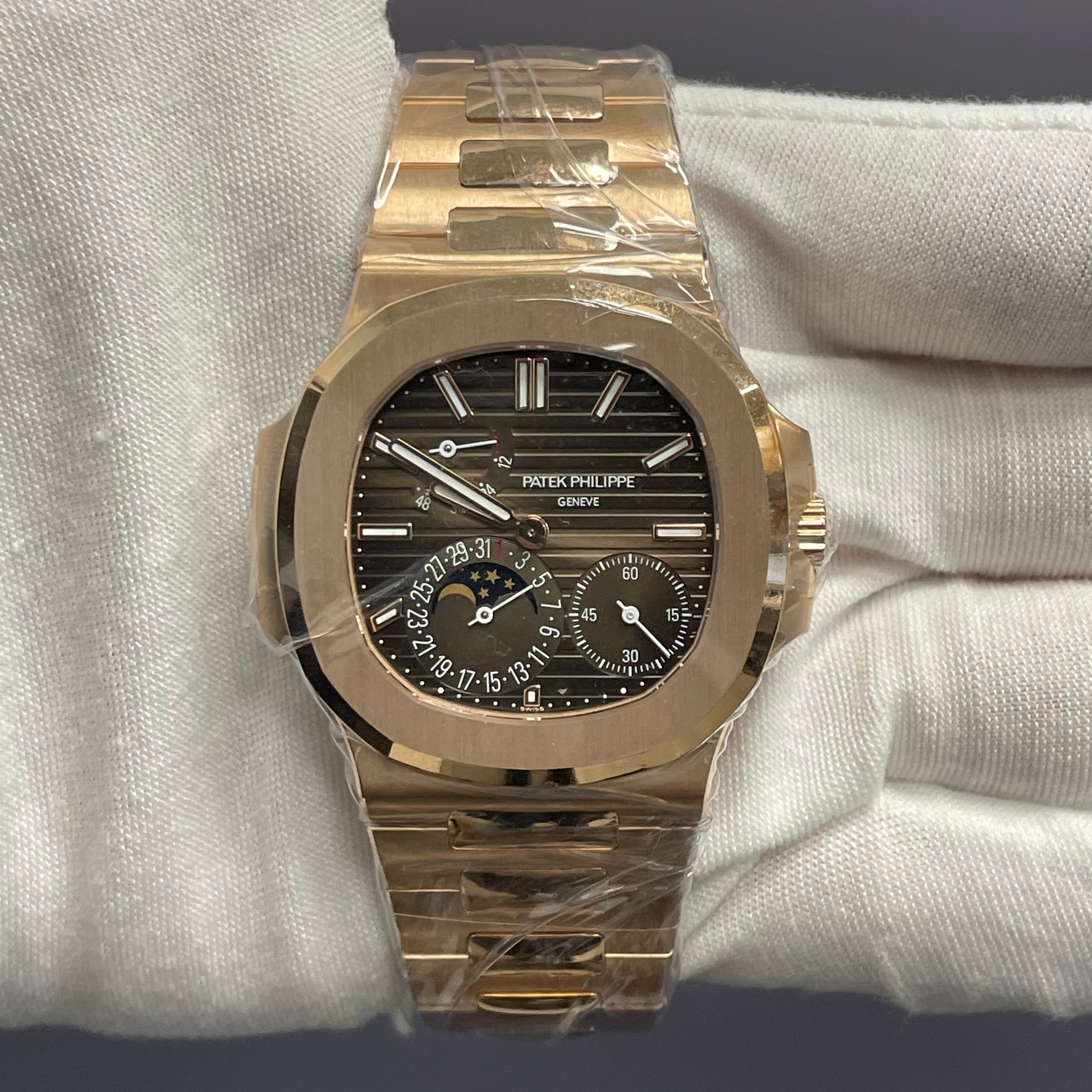 Patek Philippe Nautilus 40.5mm Brown Dial Watch Ref# 5712/1R-001 - Happy Jewelers Fine Jewelry Lifetime Warranty