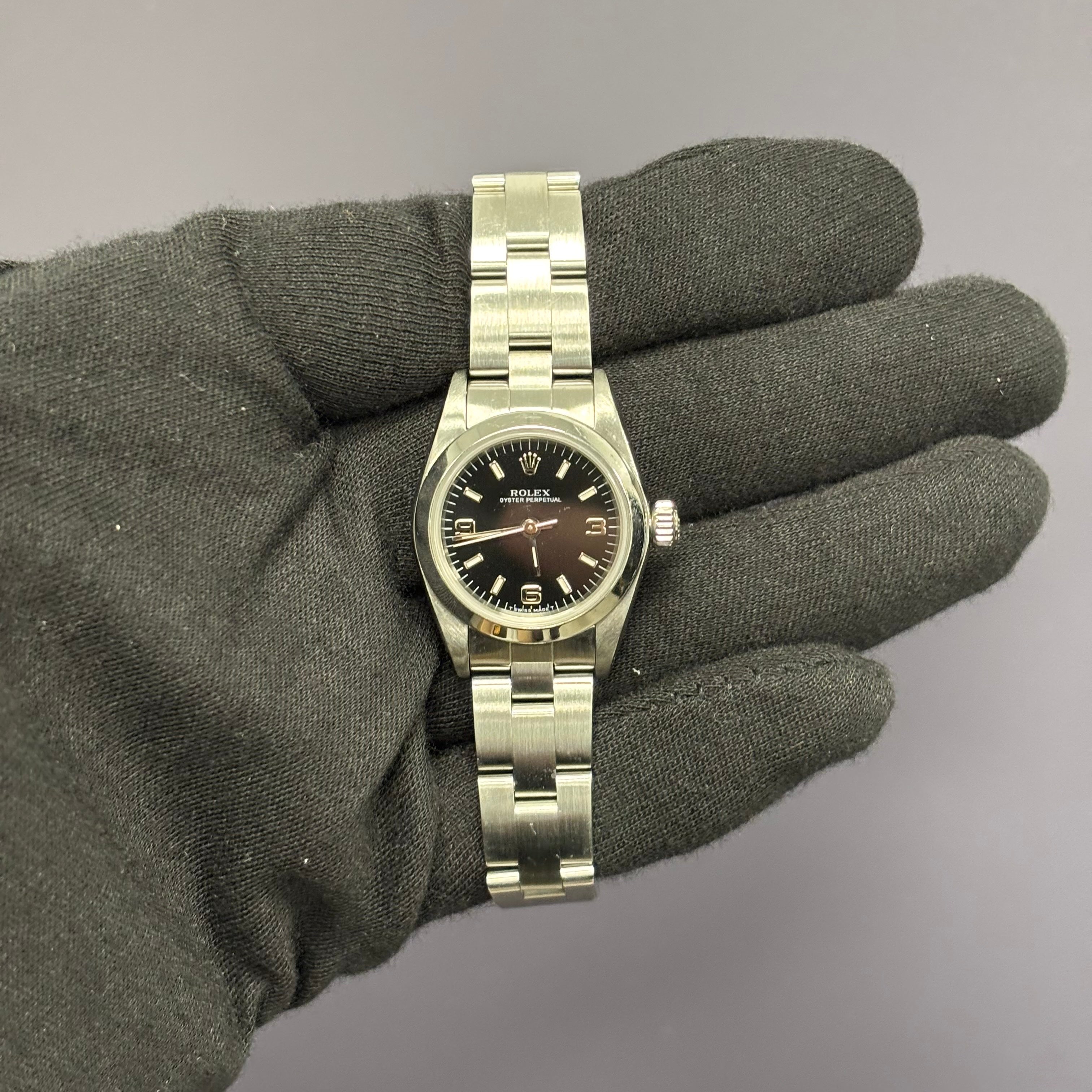 Rolex Oyster Perpetual 26mm Black Dial Watch Ref# 67180 - Happy Jewelers Fine Jewelry Lifetime Warranty