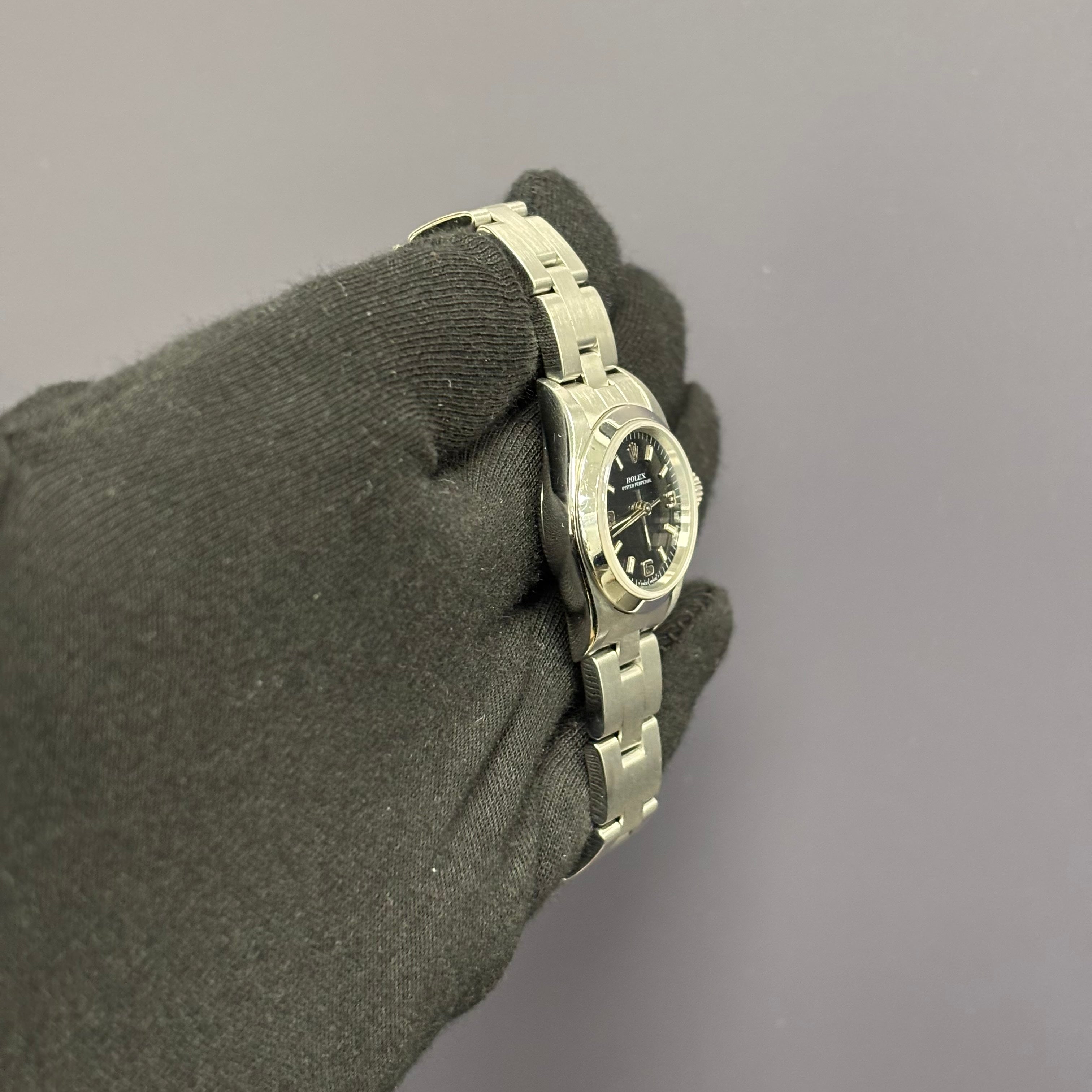 Rolex Oyster Perpetual 26mm Black Dial Watch Ref# 67180 - Happy Jewelers Fine Jewelry Lifetime Warranty