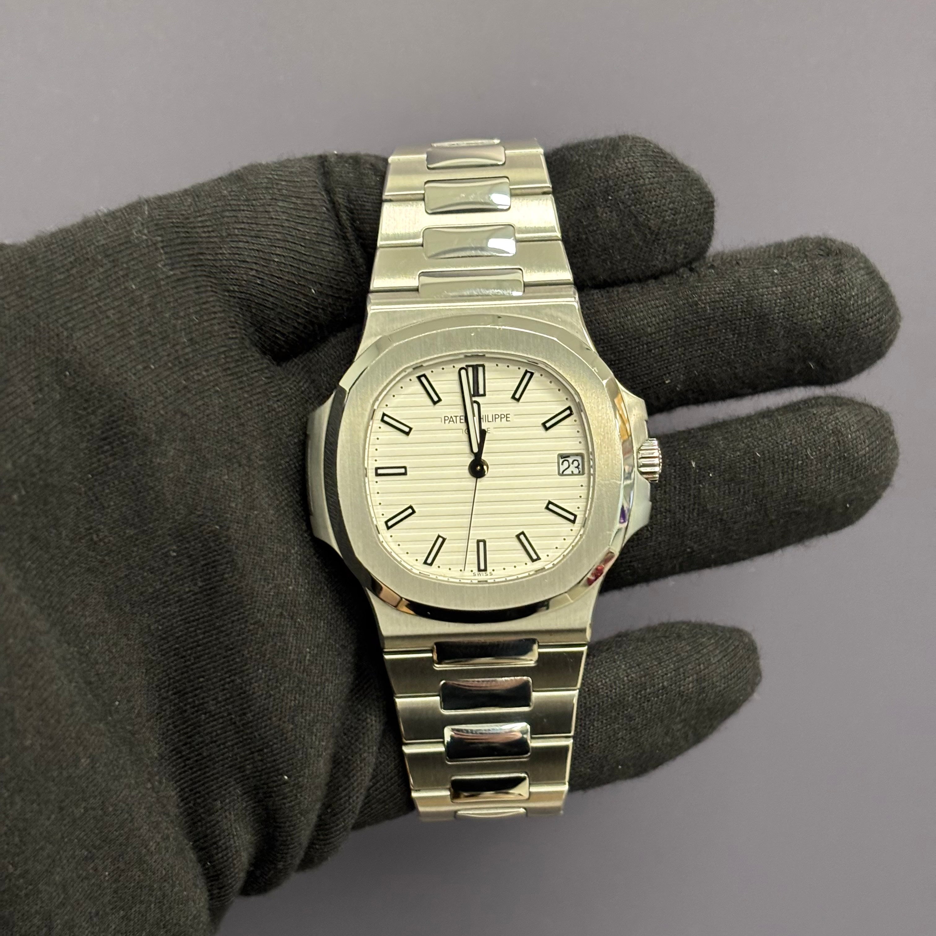 Patek Philippe Nautilus 40mm White Dial Watch Ref# 5711/1A-011 - Happy Jewelers Fine Jewelry Lifetime Warranty