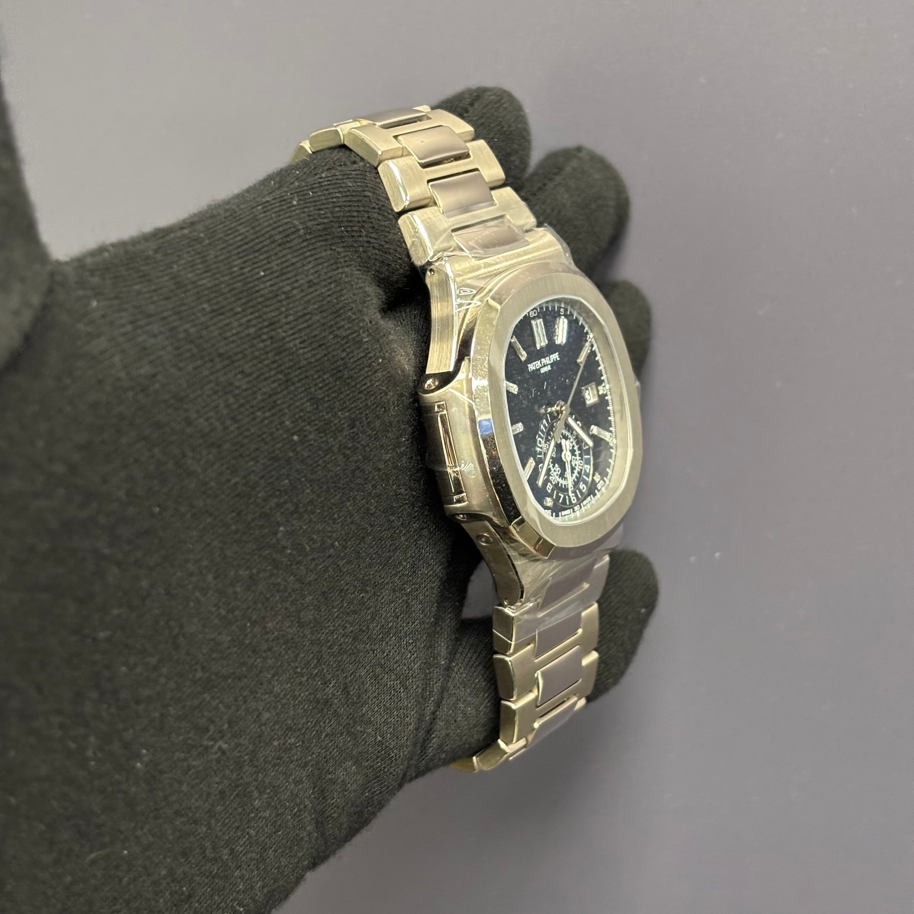 Patek Philippe Nautilus 44mm Blue Dial Watch Ref# 5976/1G-001 - Happy Jewelers Fine Jewelry Lifetime Warranty