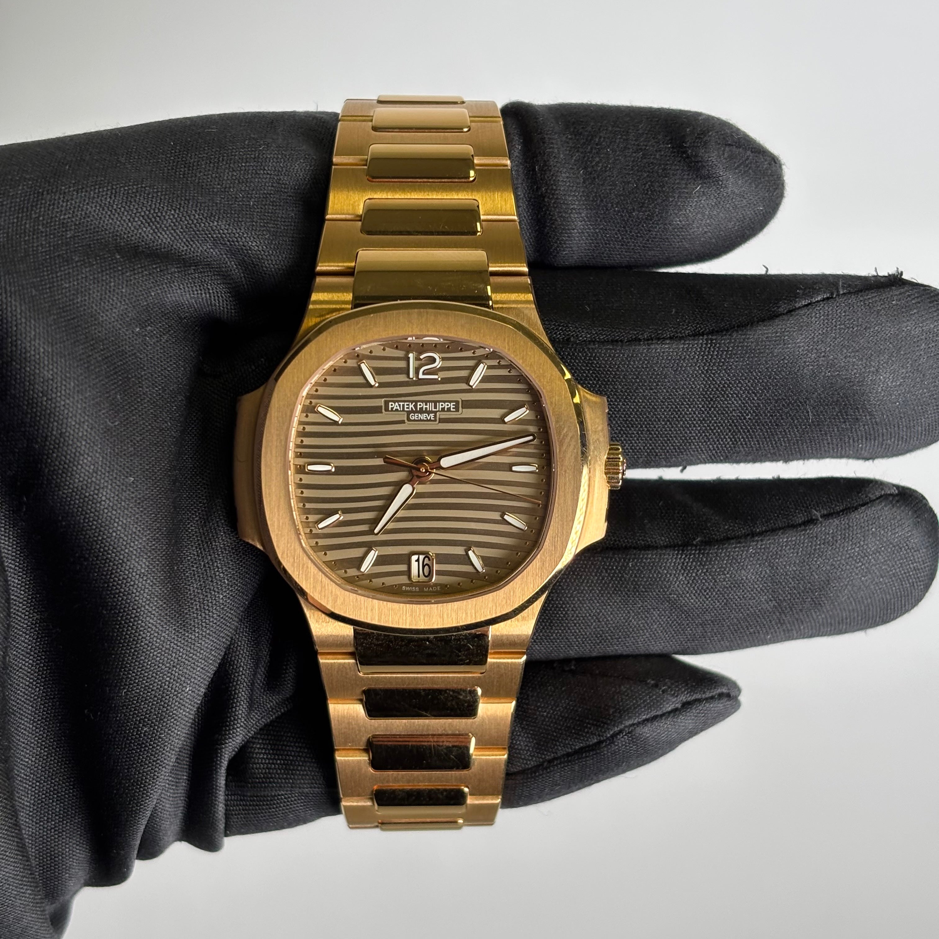 Patek Philippe Nautilus 35mm Champagne Dial Watch Ref# 7118/1R-010 - Happy Jewelers Fine Jewelry Lifetime Warranty