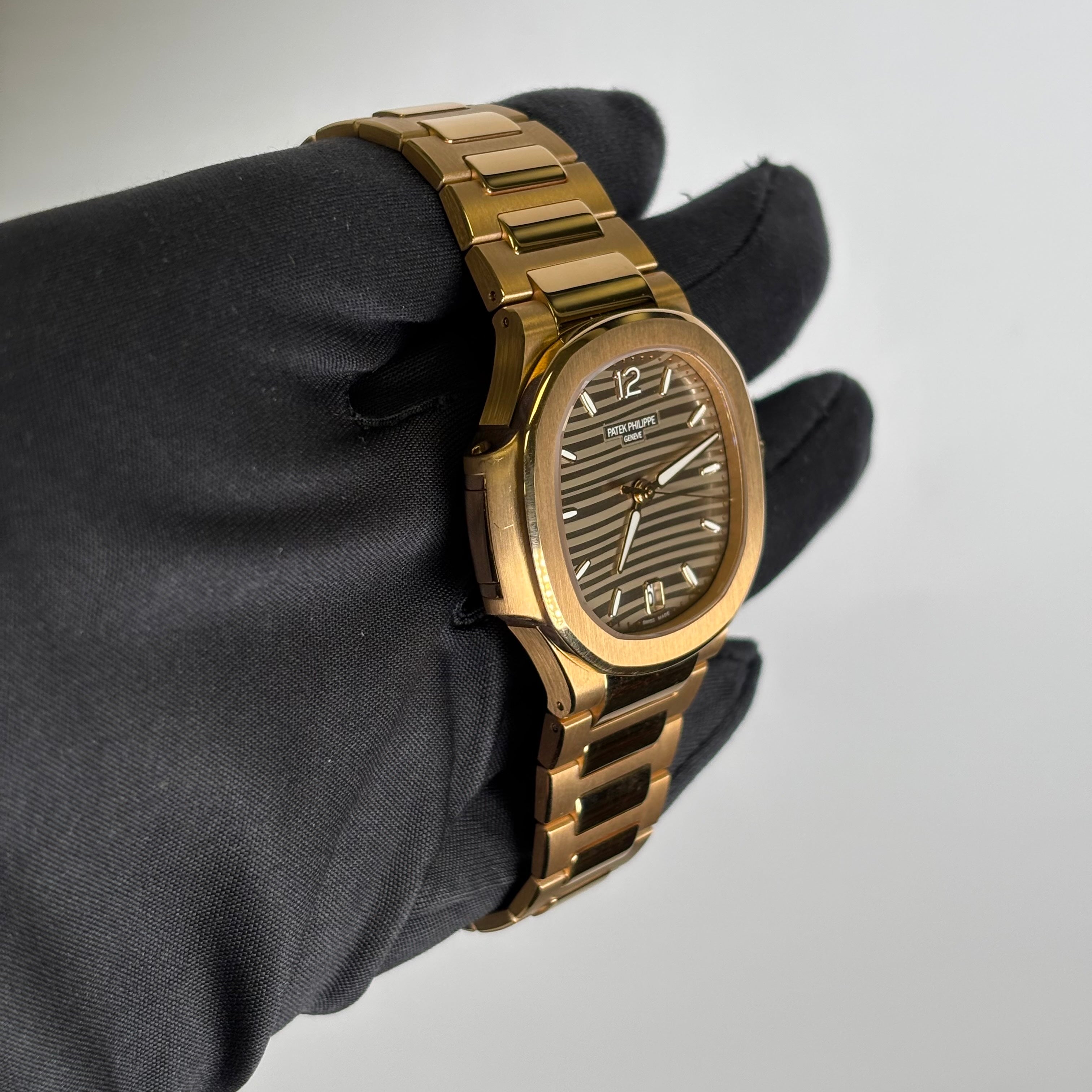 Patek Philippe Nautilus 35mm Champagne Dial Watch Ref# 7118/1R-010 - Happy Jewelers Fine Jewelry Lifetime Warranty