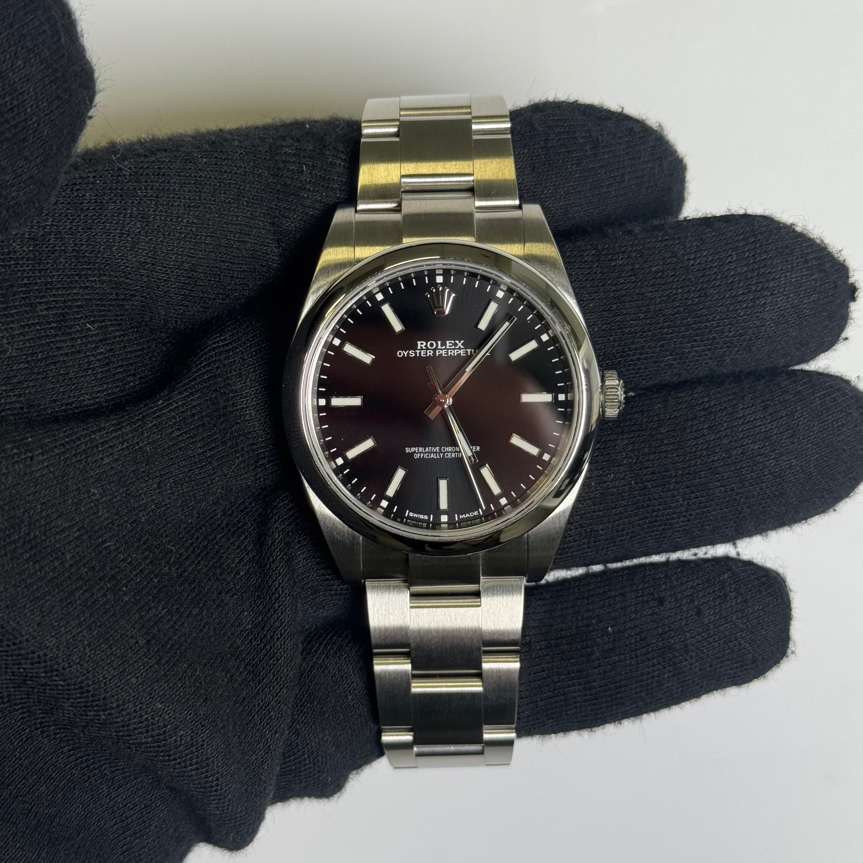 Rolex Oyster Perpetual 39mm Black Dial Watch Ref# 114300 - Happy Jewelers Fine Jewelry Lifetime Warranty