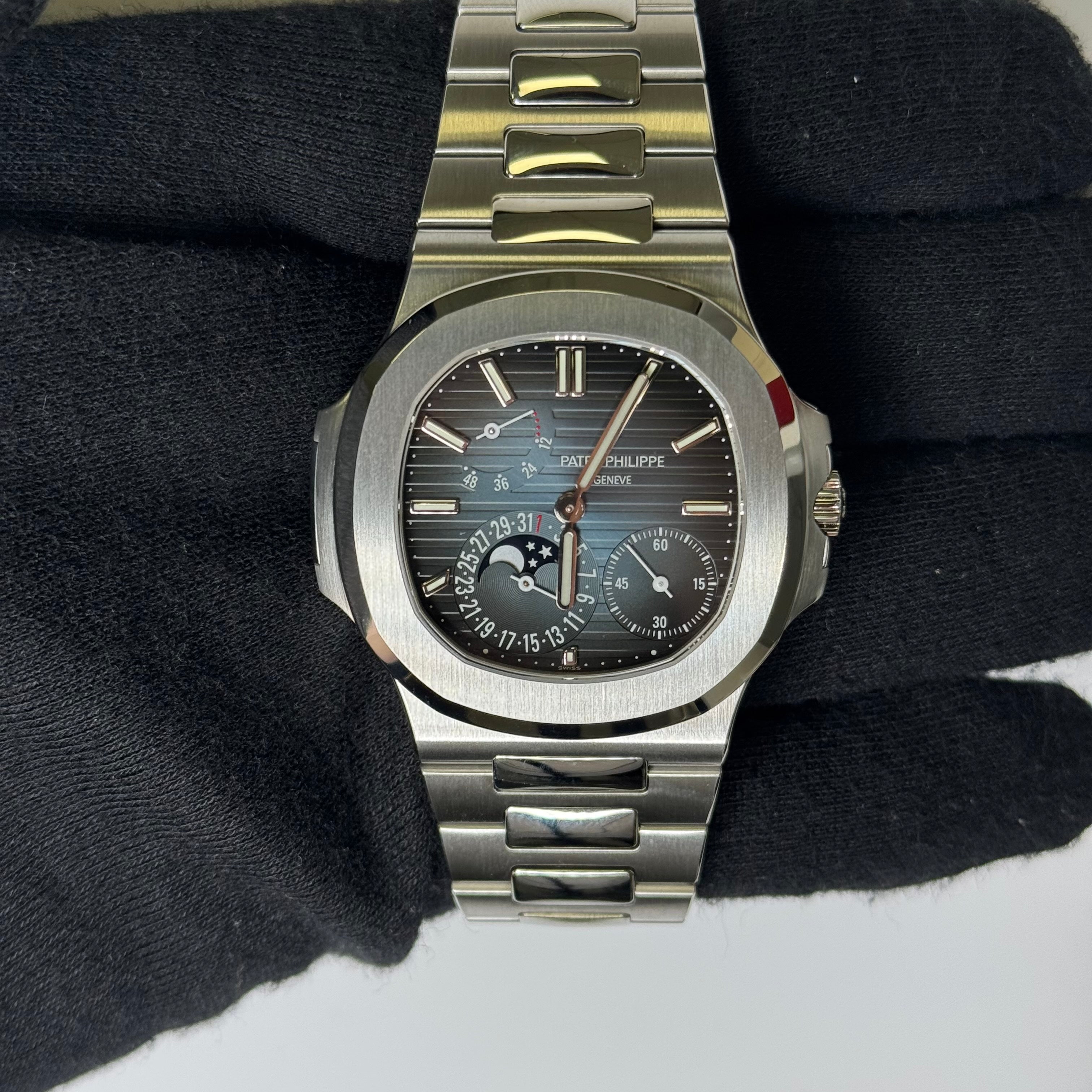 Patek Philippe Nautilus 40.5mm Blue Dial Watch Ref# 5712/1A-001 - Happy Jewelers Fine Jewelry Lifetime Warranty