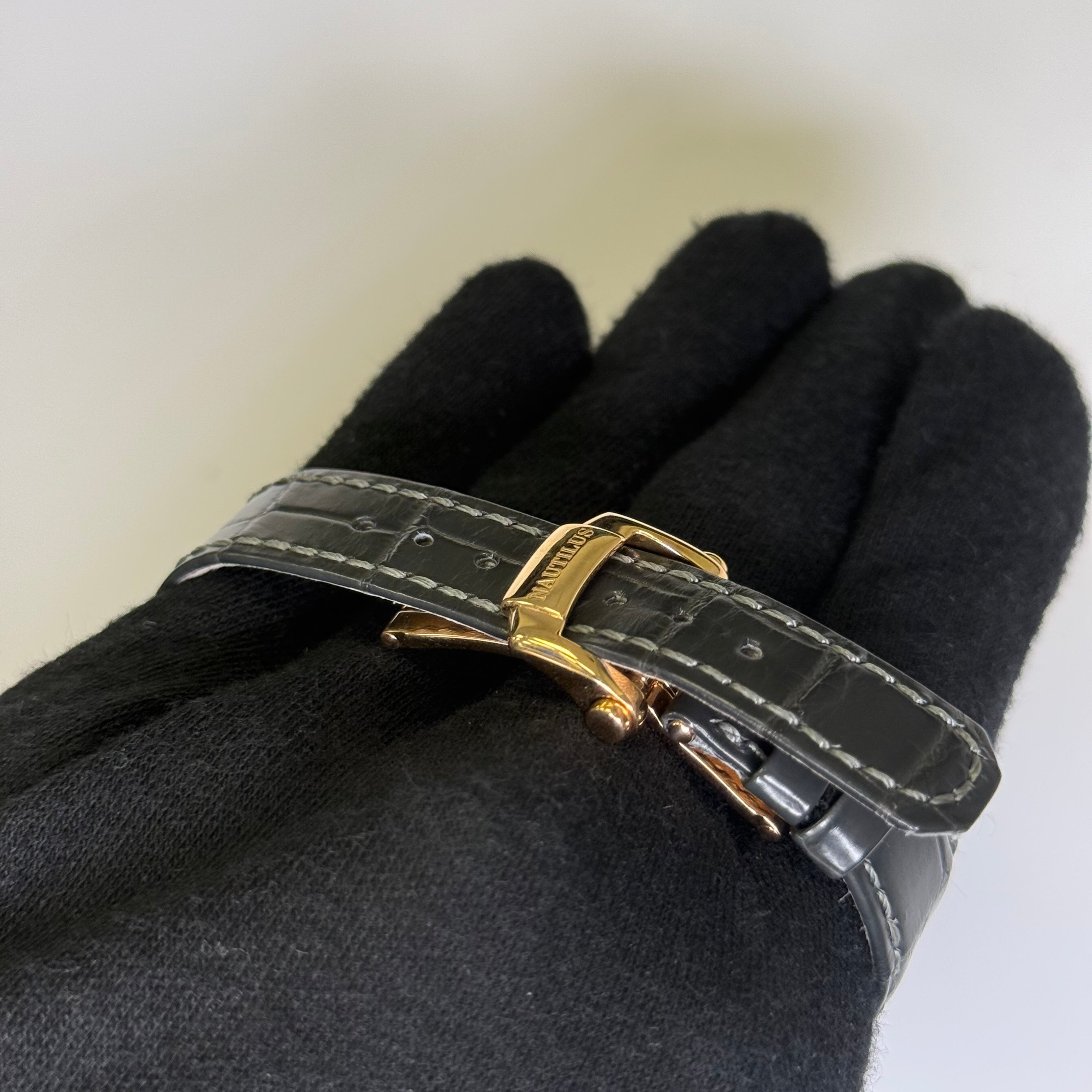 Patek Philippe Nautilus 32mm Brown Dial Watch Ref# 7010R/010 - Happy Jewelers Fine Jewelry Lifetime Warranty