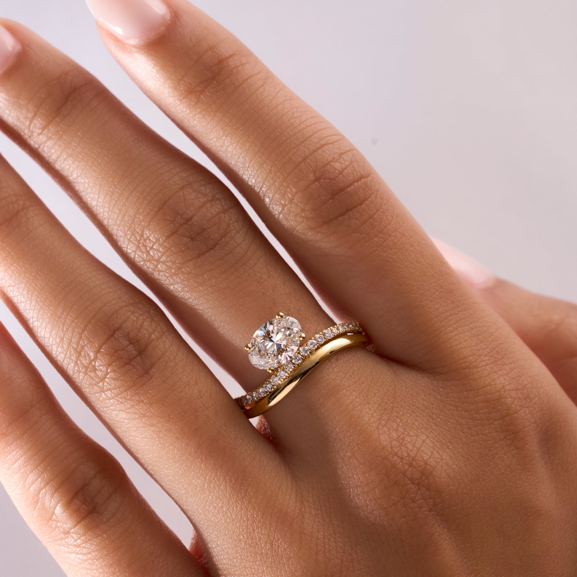 Pear Double Motion Solid and Diamond Ring
