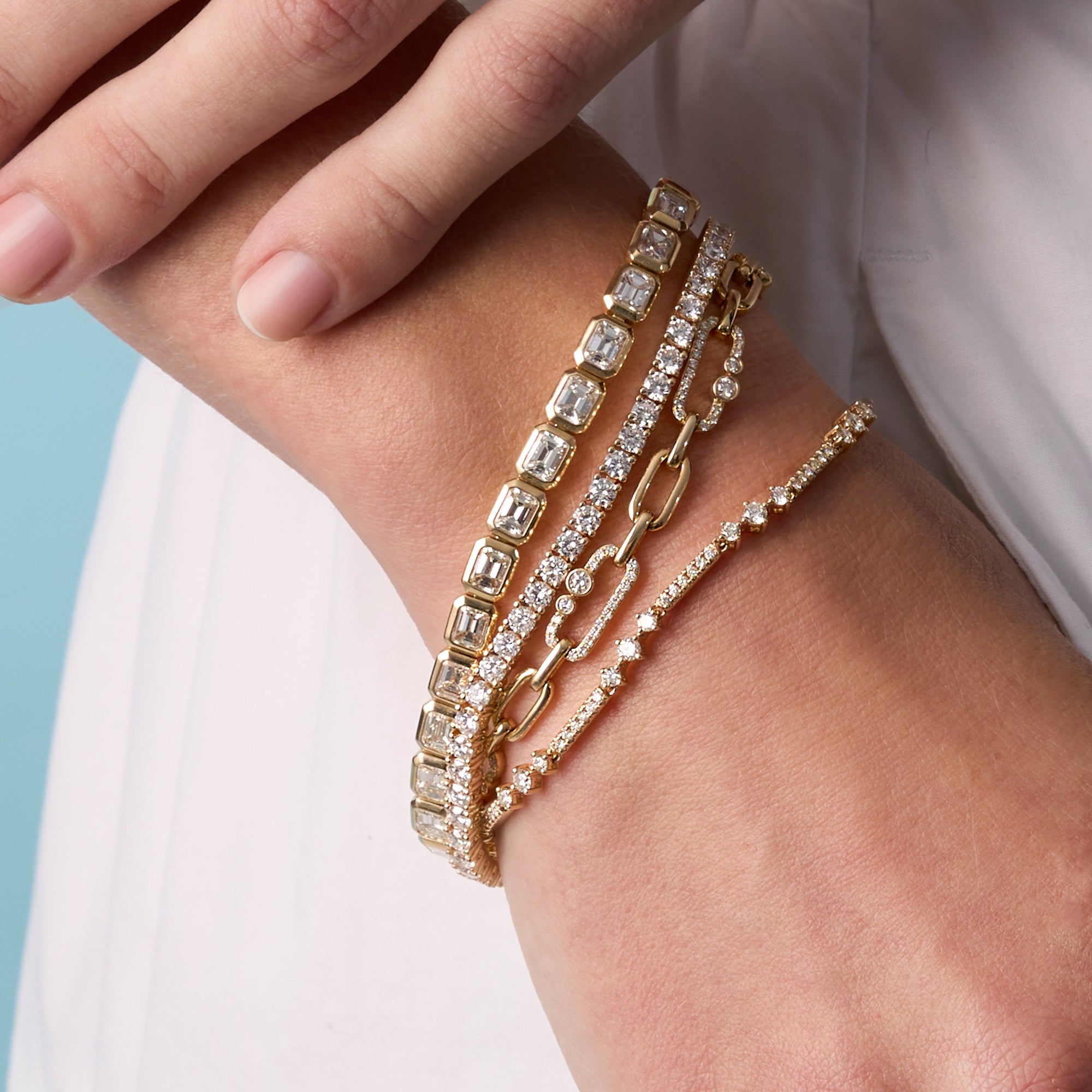 Yellow Gold East-West Emerald Tennis Bracelet On Figure
