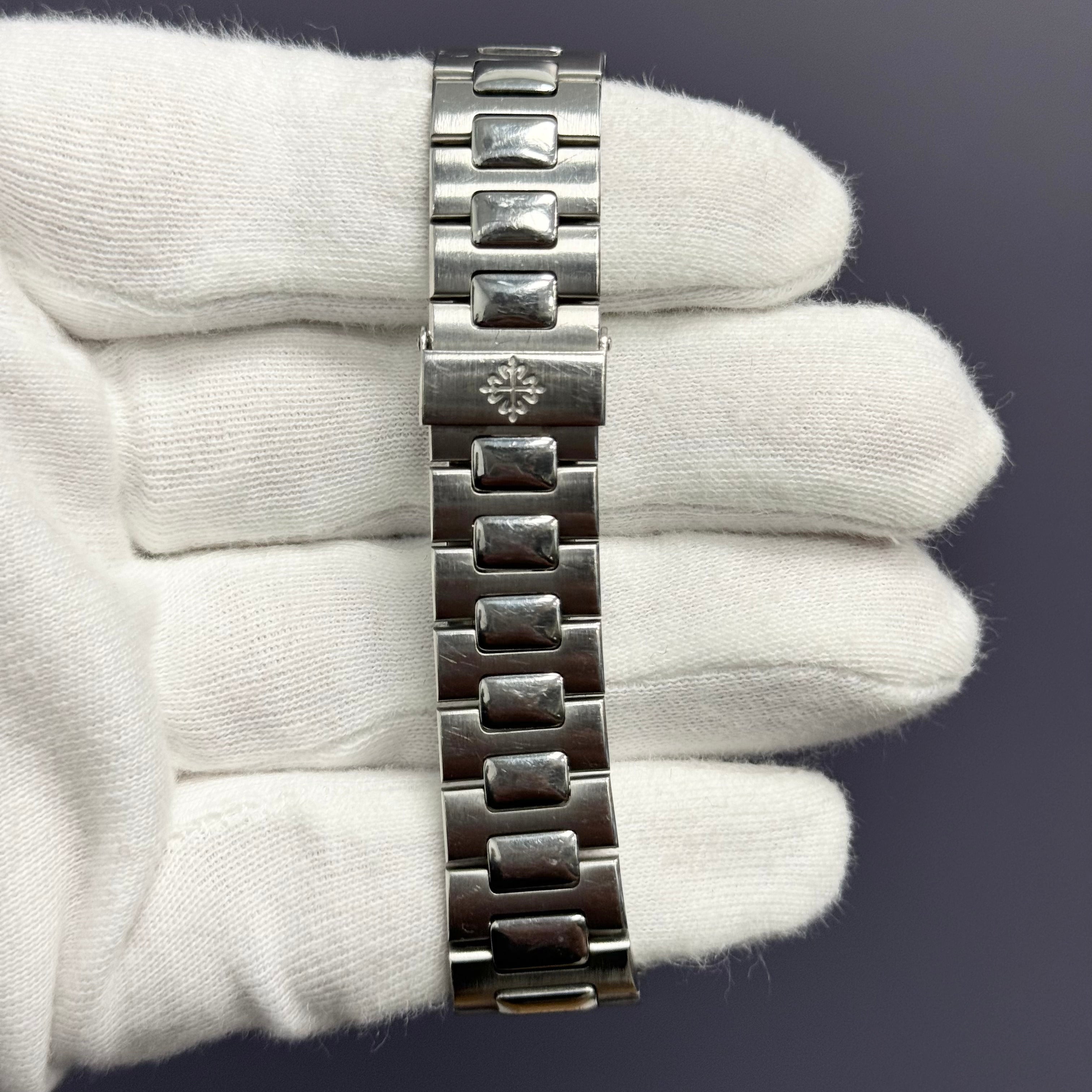 Patek Philippe Nautilus 37.5mm White Stick Dial Watch Ref# 3800 - Happy Jewelers Fine Jewelry Lifetime Warranty