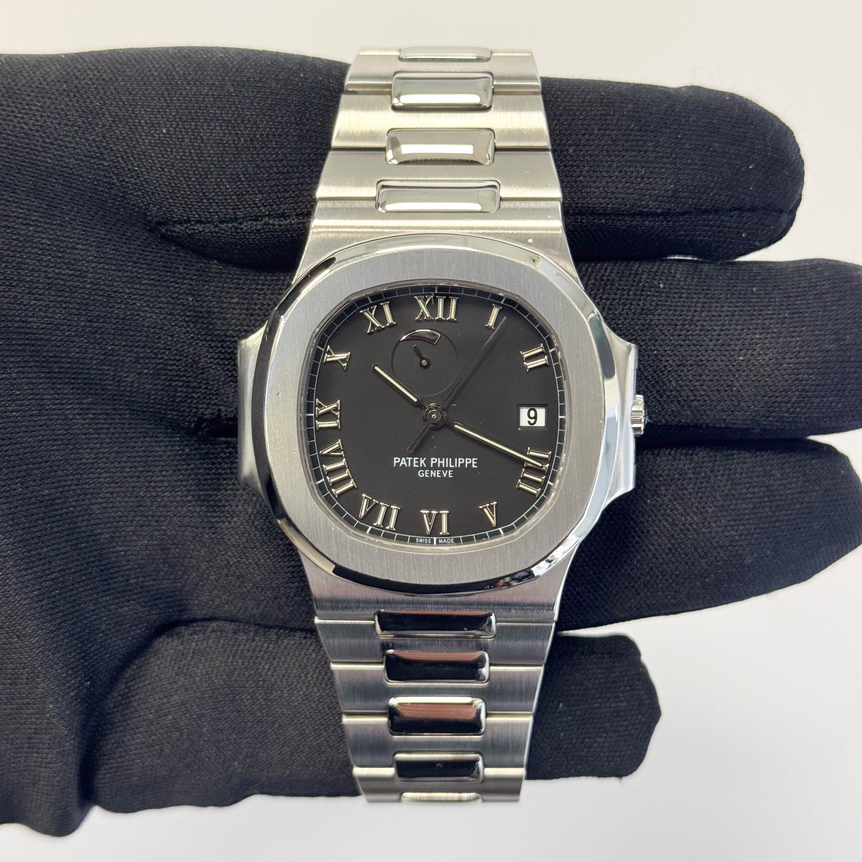 Patek Philippe Nautilus 40mm Black Dial Watch Ref# 3710/1A - Happy Jewelers Fine Jewelry Lifetime Warranty