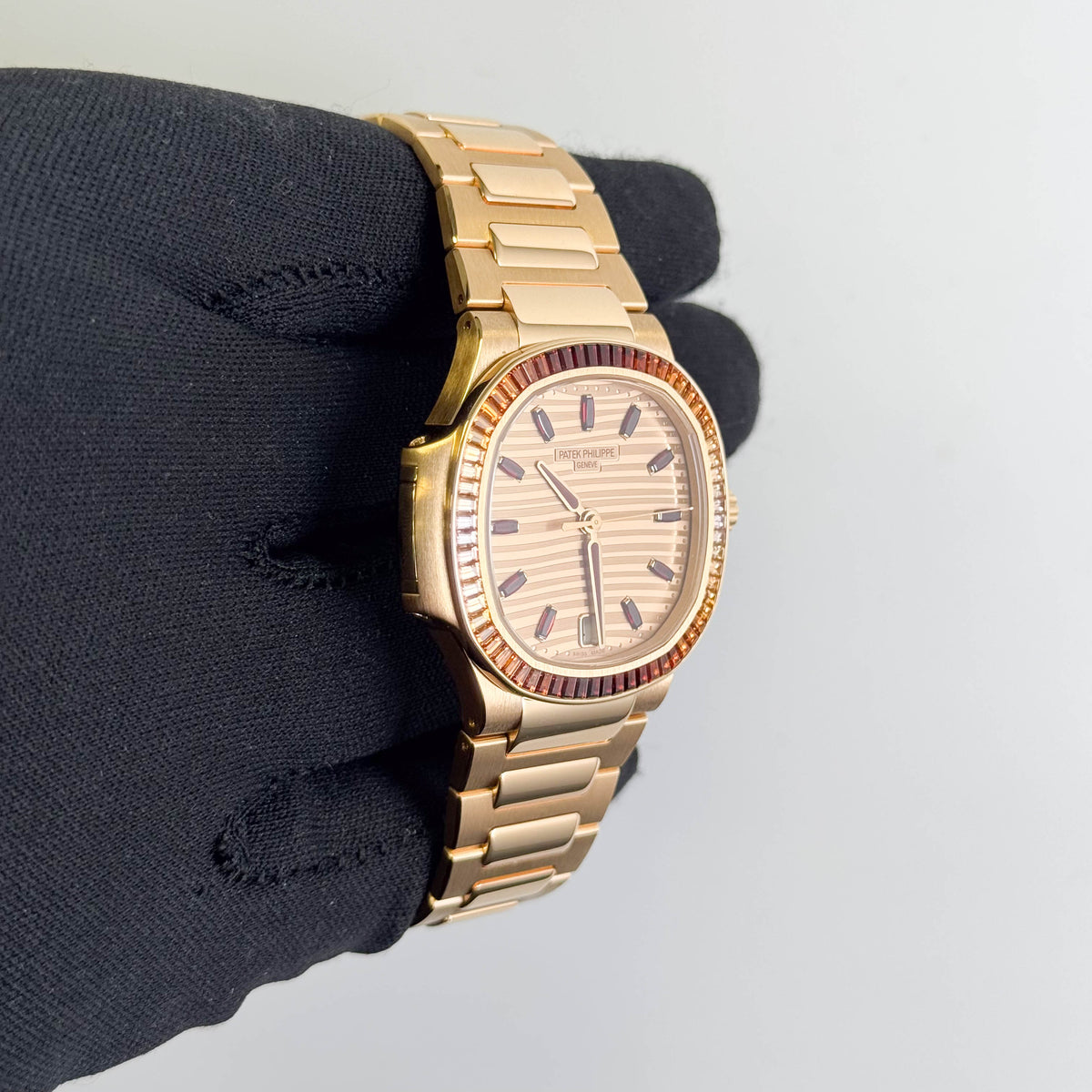 Patek Philippe Nautilus 35mm Rose Dial Watch Ref# 7118/1300R-001