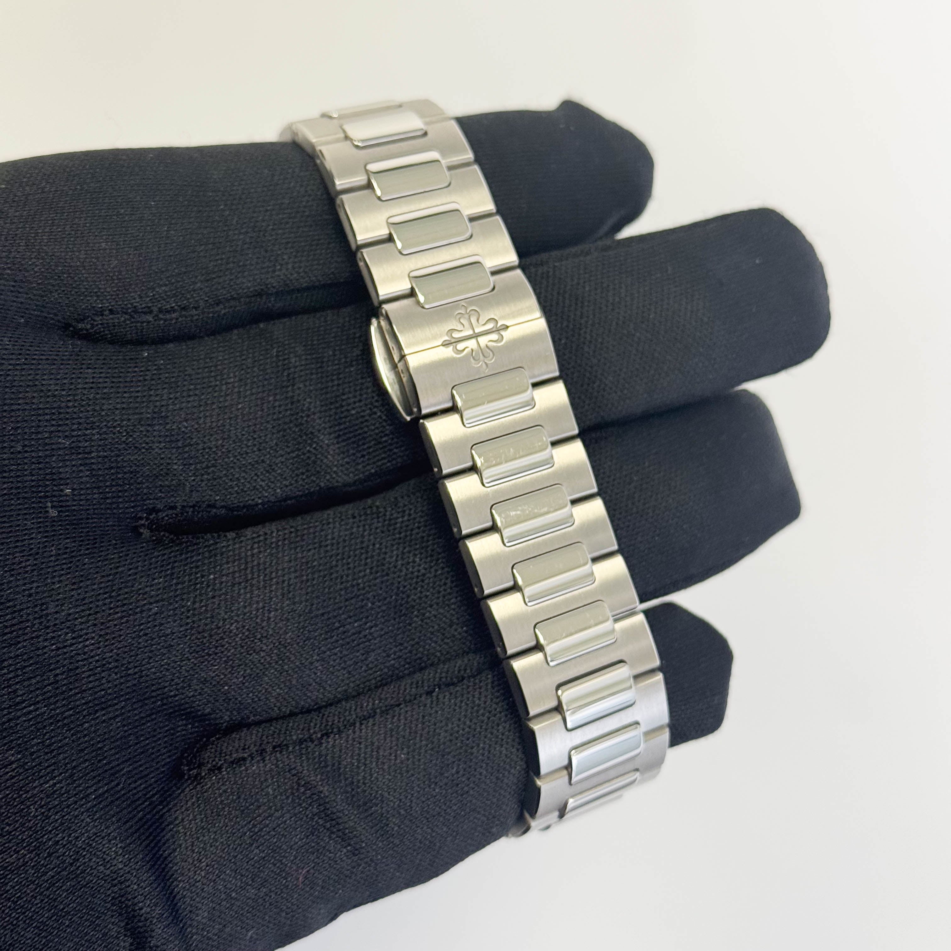 Patek Philippe Nautilus 35.2mm Silver Opaline Dial Watch Ref# 7118/1A-010