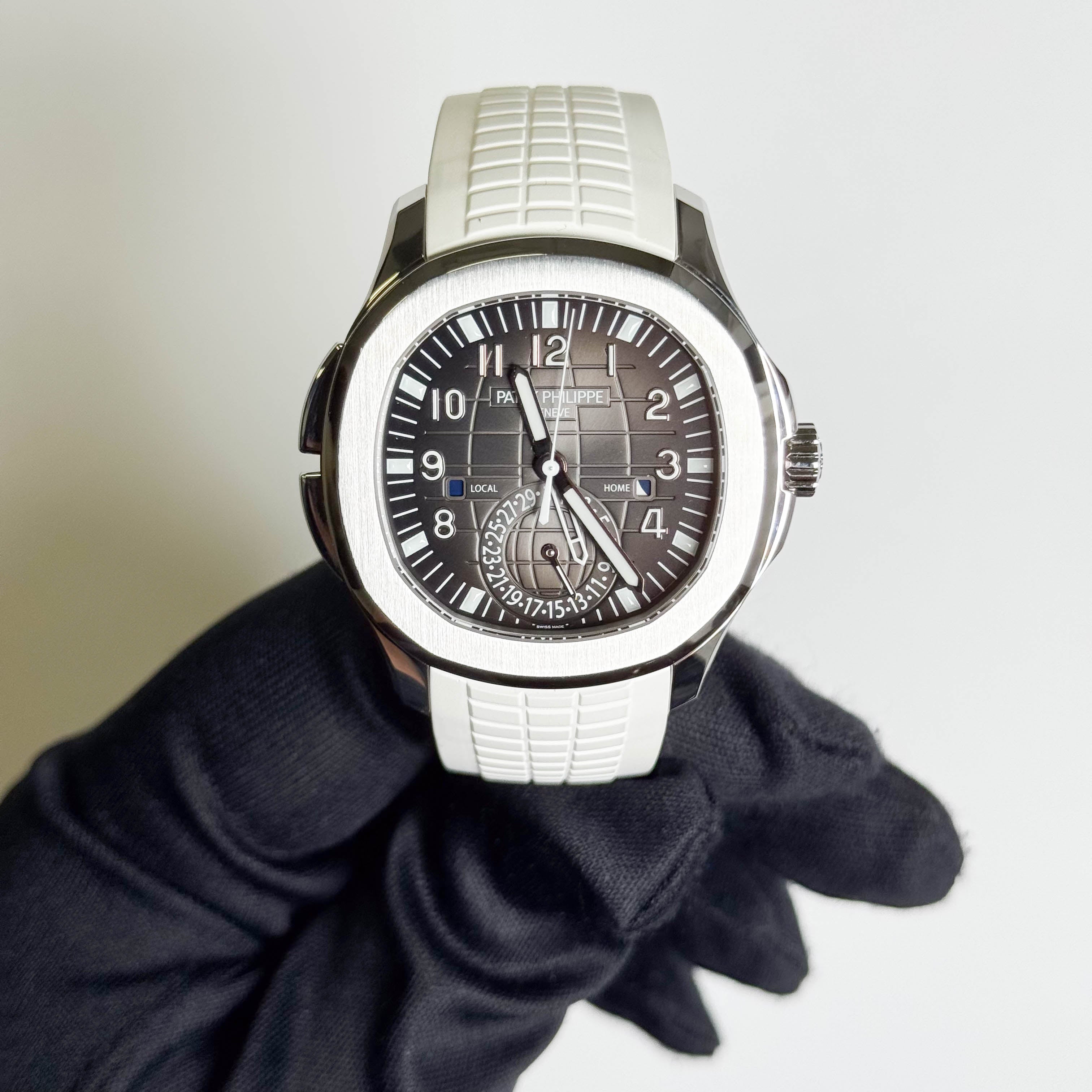 Patek Philippe Aquanaut Travel Time 40mm Black Dial Watch Ref# 5164A-001 - Happy Jewelers Fine Jewelry Lifetime Warranty