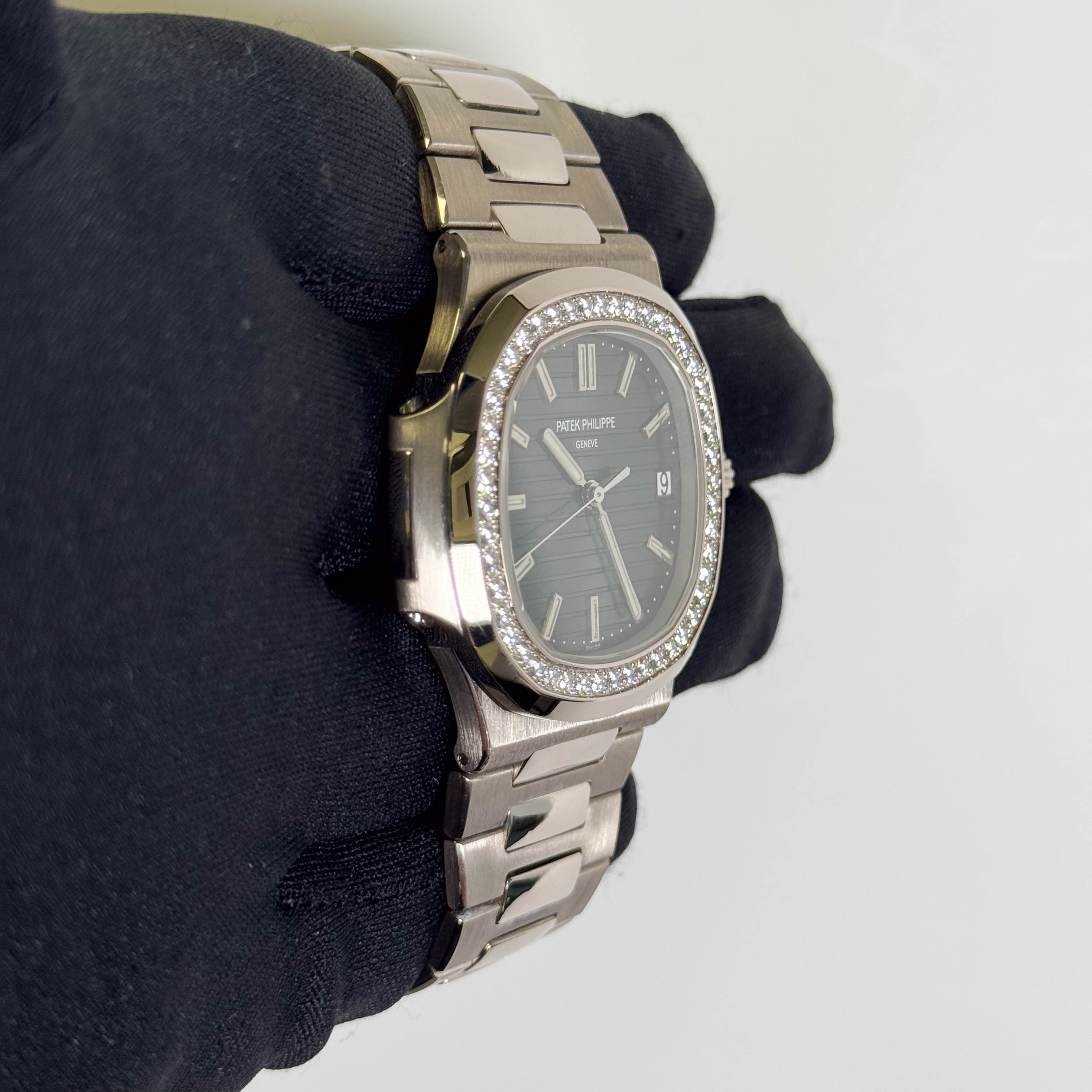Patek Philippe Nautilus 40mm Blue Dial Watch Ref# 5713/1G-001 - Happy Jewelers Fine Jewelry Lifetime Warranty