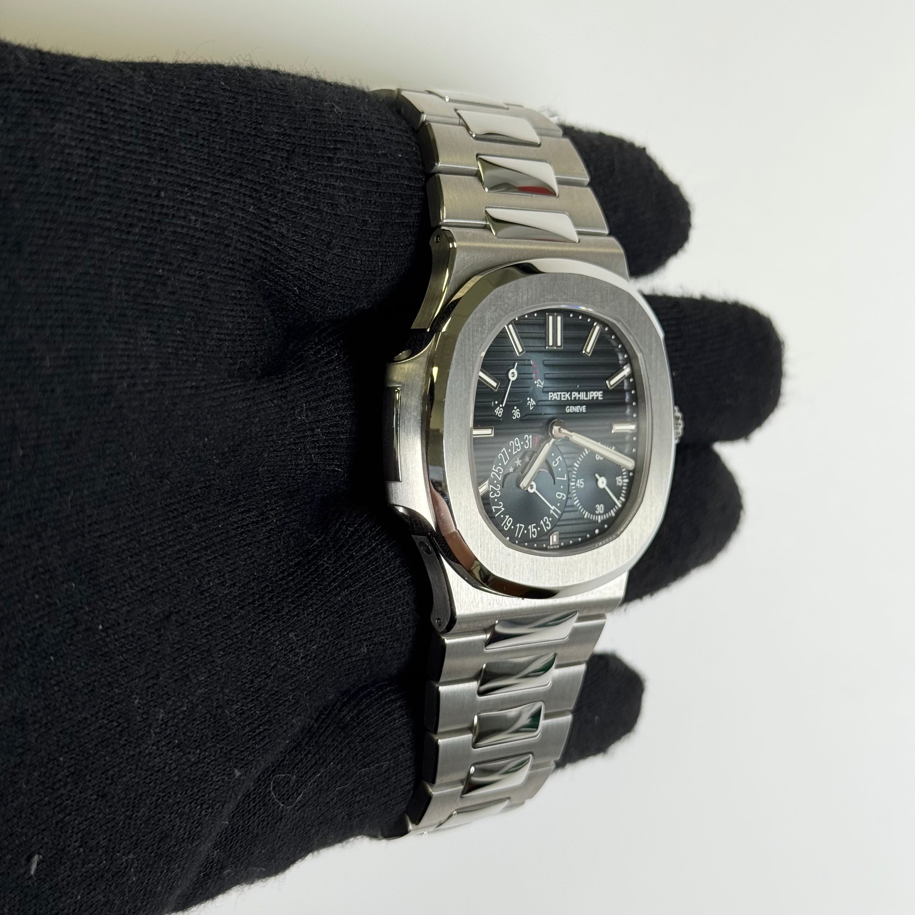 Patek Philippe Nautilus 40.5mm Blue Dial Watch Ref# 5712/1A-001 - Happy Jewelers Fine Jewelry Lifetime Warranty