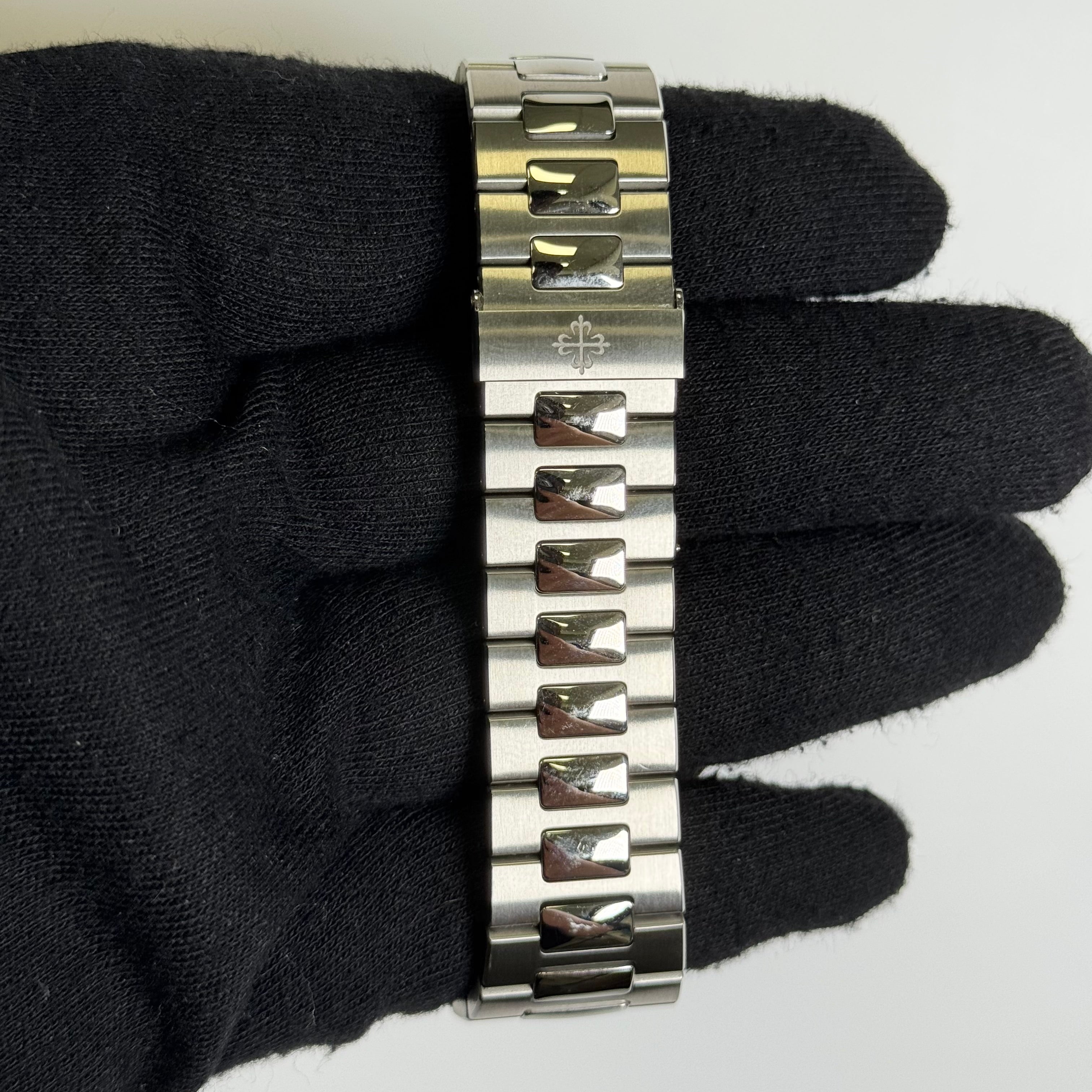 Patek Philippe Nautilus 40.5mm Blue Dial Watch Ref# 5712/1A-001 - Happy Jewelers Fine Jewelry Lifetime Warranty