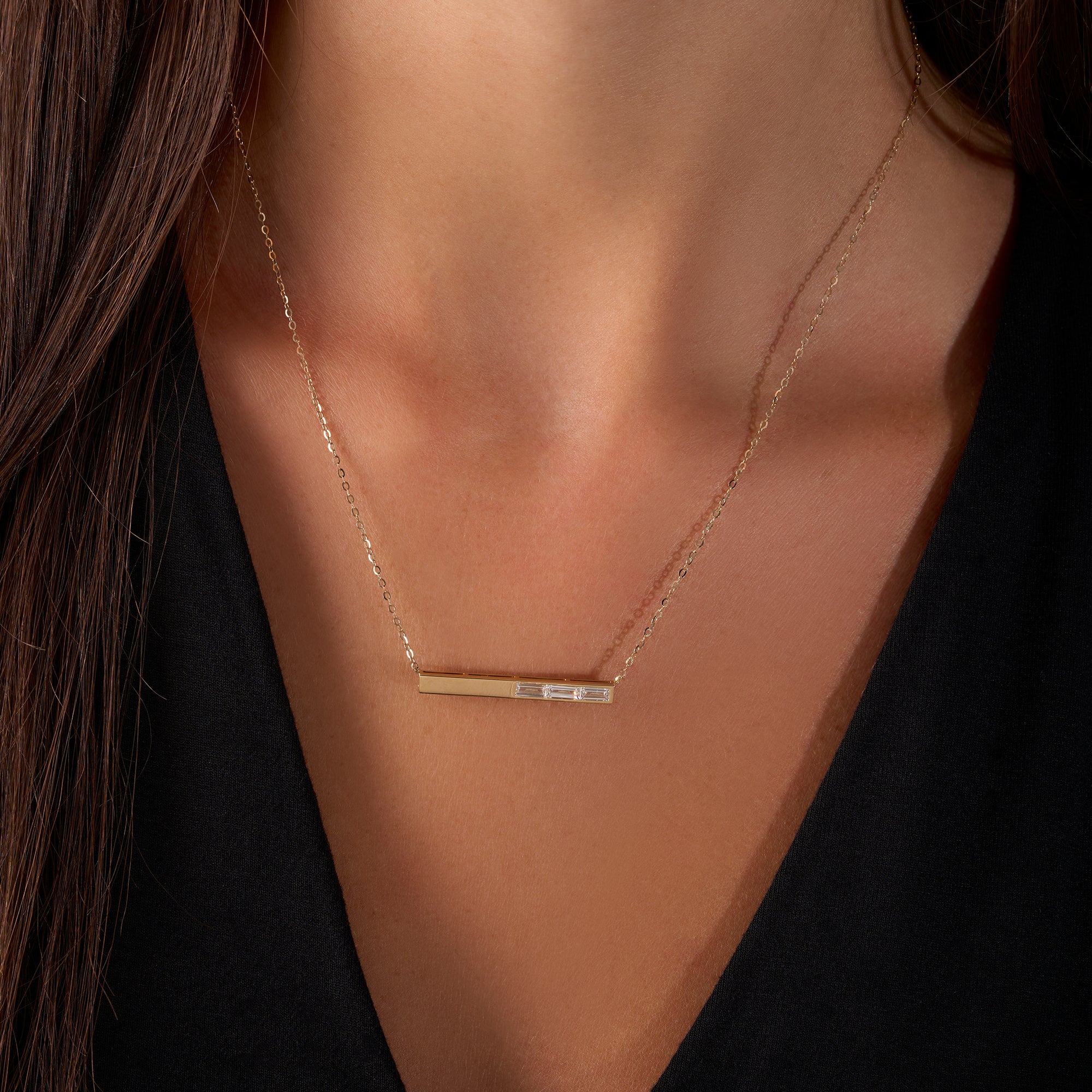 Yellow Gold Three Stone Baguette Diamond Bar Necklace On Figure