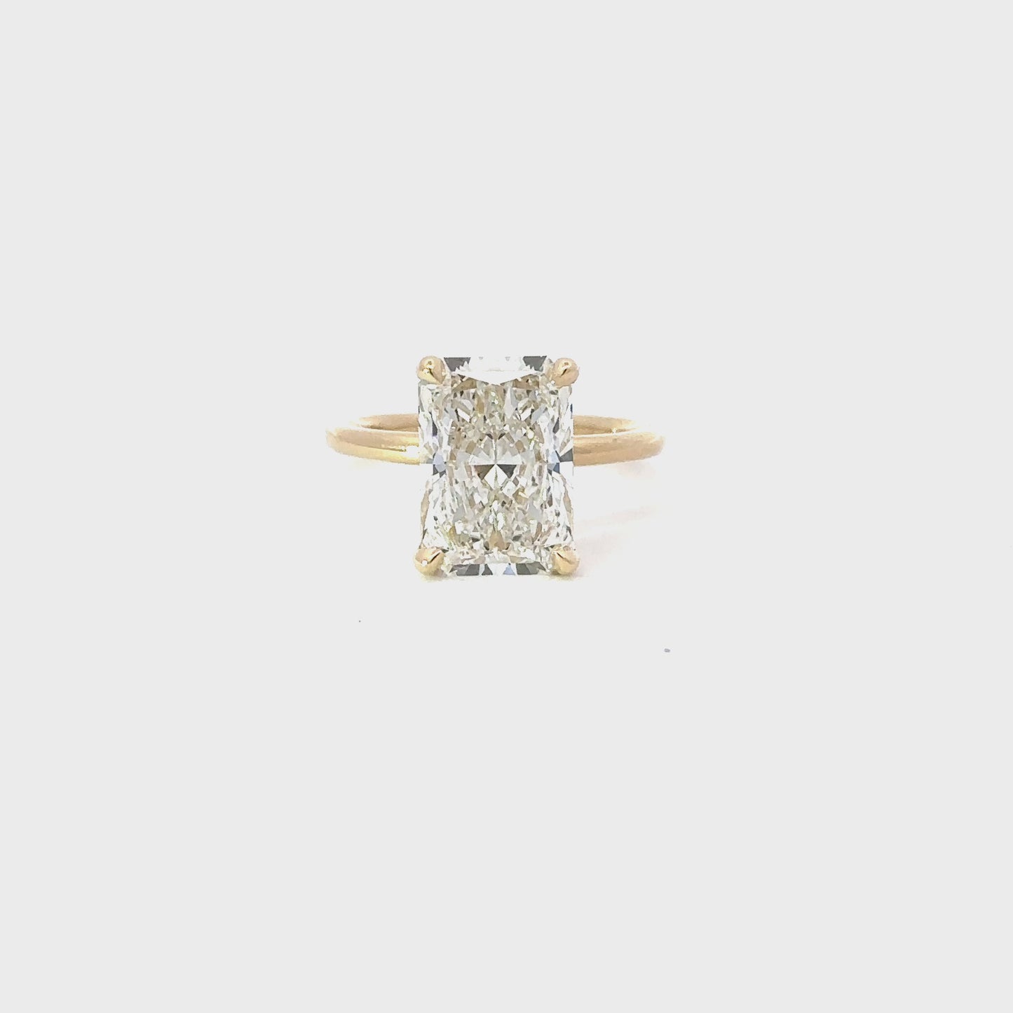 Load and play video in Gallery viewer, 4.57 Carat Lab Created Radiant Engagement Ring with Hidden Halo
