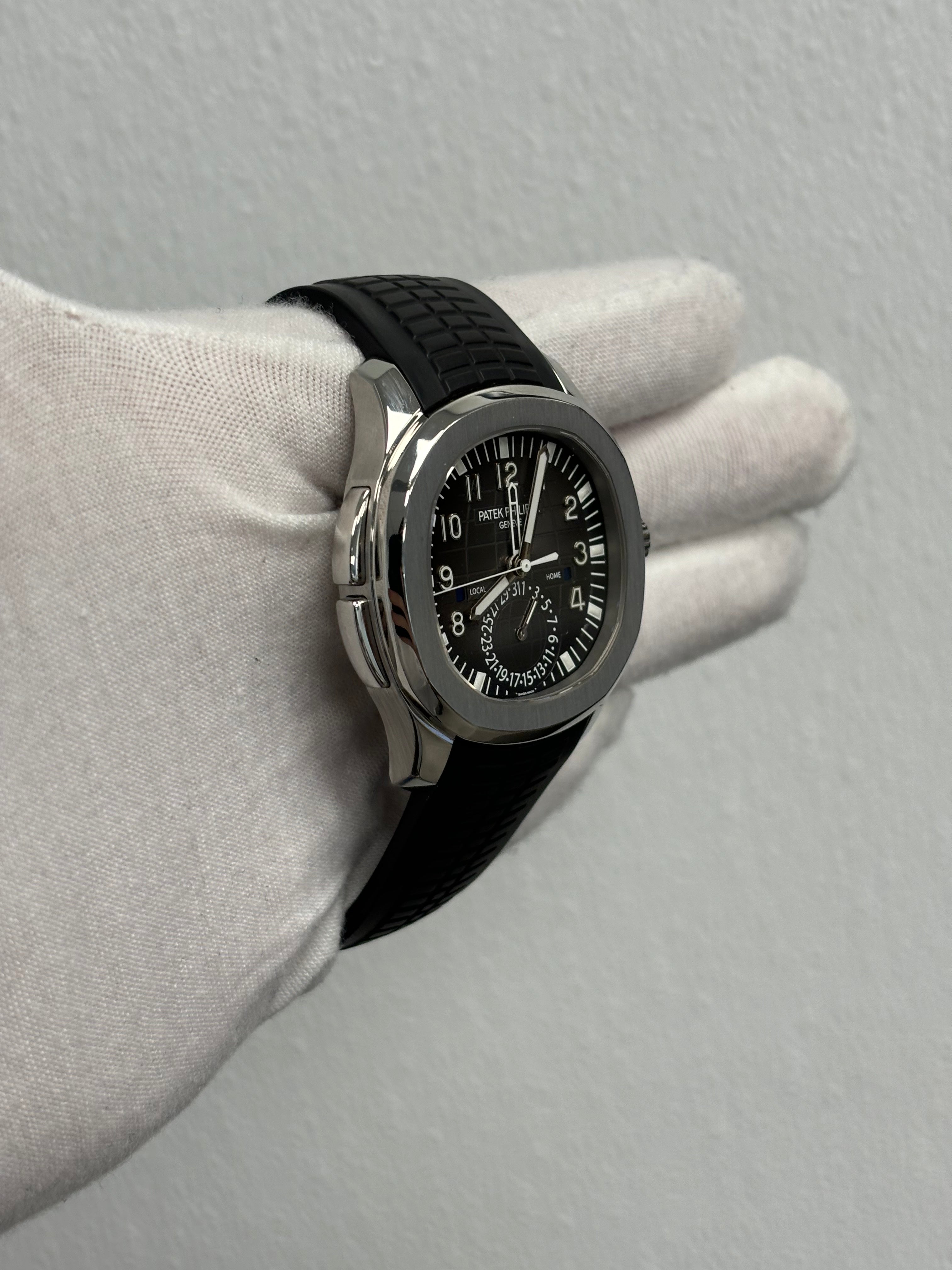 Patek Philippe Aquanaut Travel Time Stainless Steel 40mm Black Arabic Dial Watch Reference# 5164A-001 - Happy Jewelers Fine Jewelry Lifetime Warranty