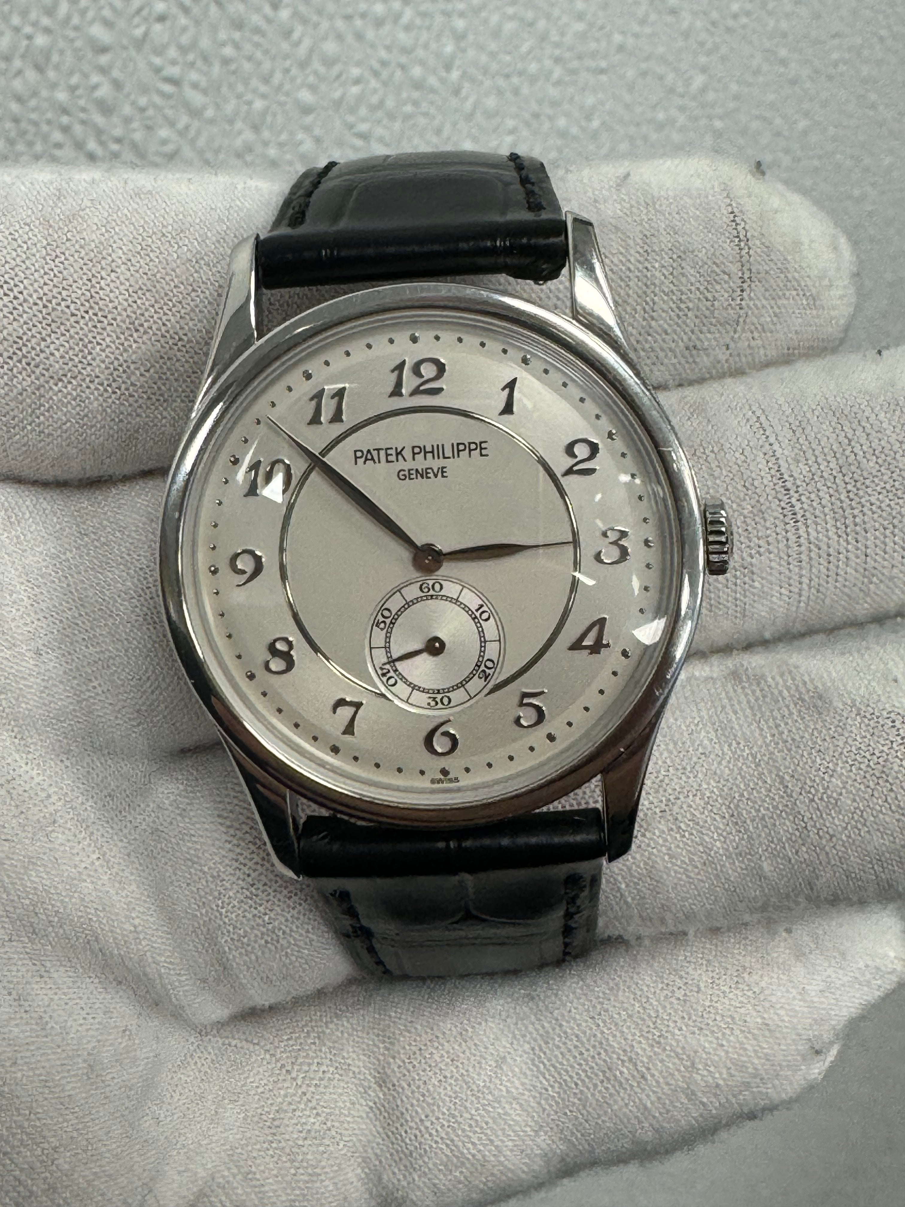 Patek Philippe Calatrava 37mm 950 Platinum Silver Arabic Dial Watch Reference# 5196P-001 - Happy Jewelers Fine Jewelry Lifetime Warranty