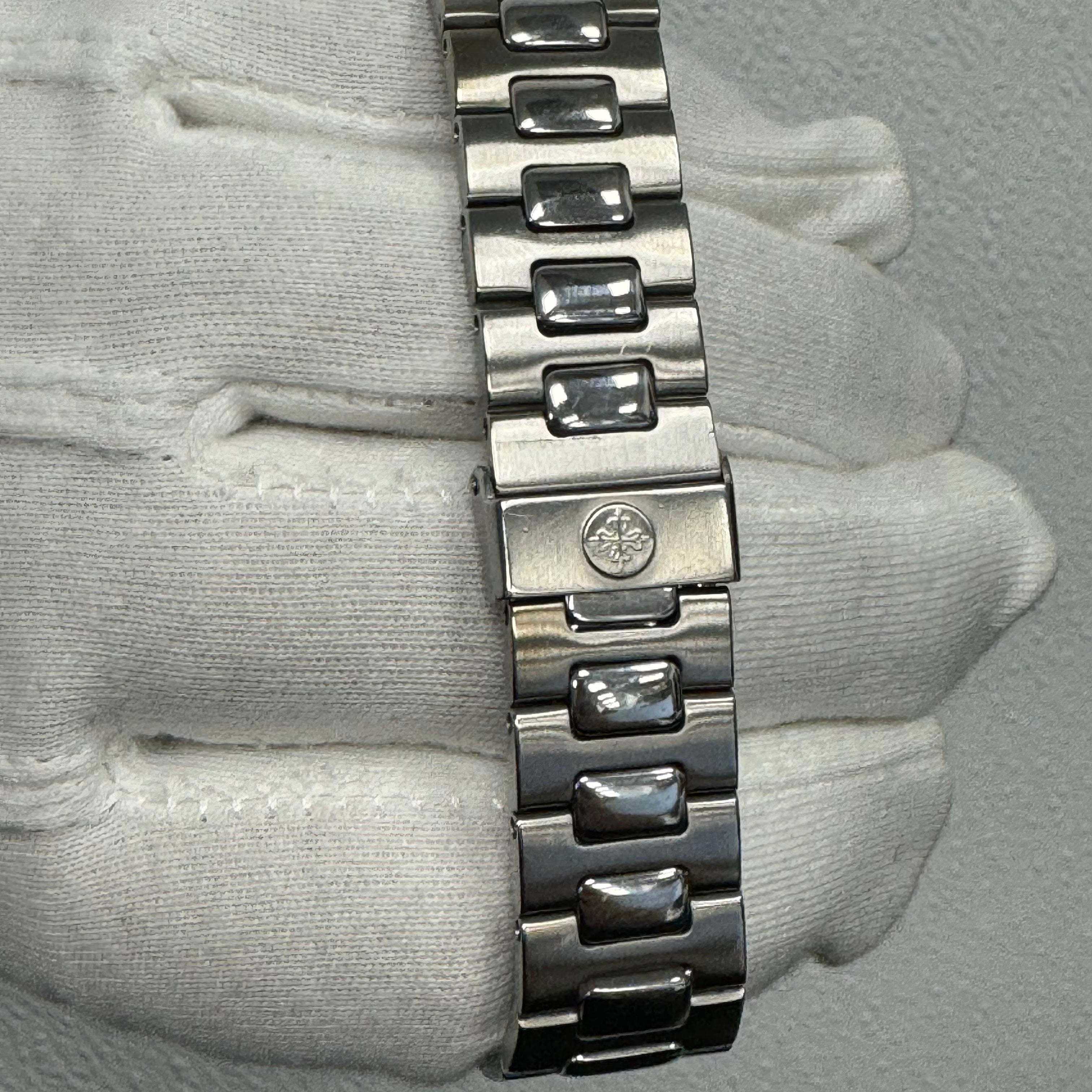 Patek Philippe Nautilus 40mm Blue "Gubelin"  Dial Watch Ref# 3700/1A-050 - Happy Jewelers Fine Jewelry Lifetime Warranty