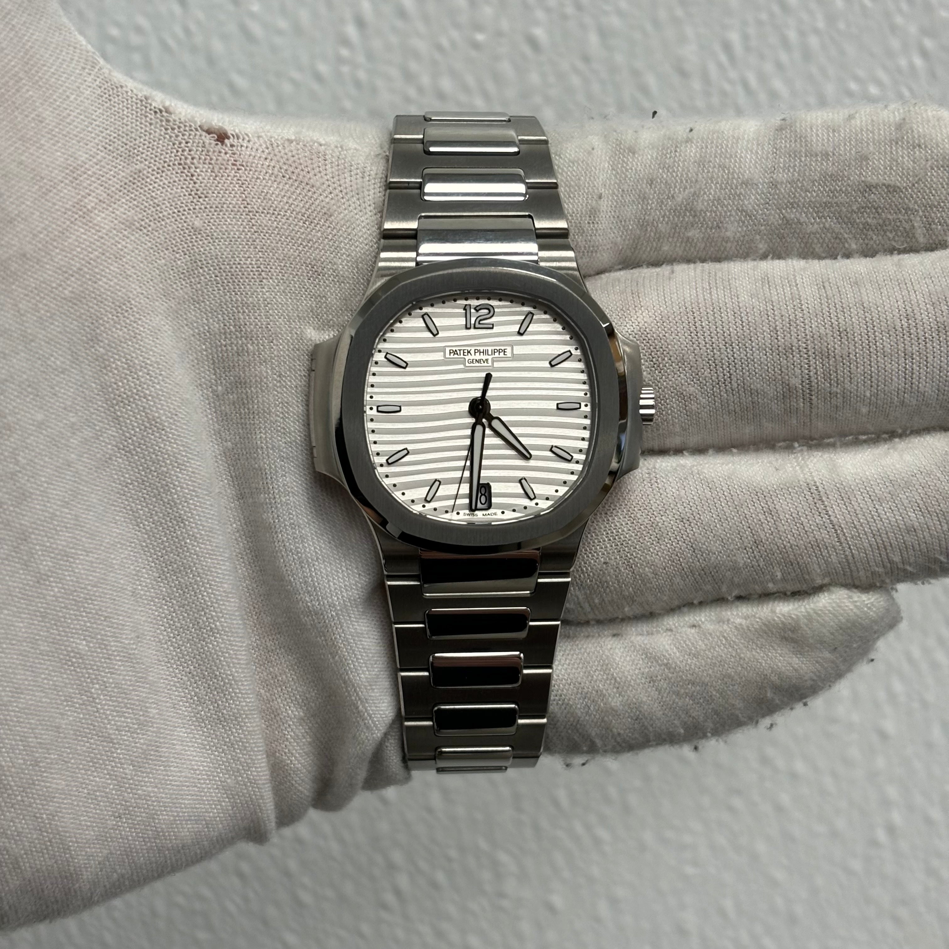 Patek Philippe Lady Nautilus 35.2mm Silver Opaline Dial Watch Ref# 7118/1A-010 - Happy Jewelers Fine Jewelry Lifetime Warranty