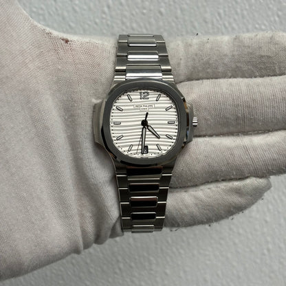 Patek Philippe Lady Nautilus 35.2mm Silver Opaline Dial Watch Ref# 7118/1A-010 - Happy Jewelers Fine Jewelry Lifetime Warranty