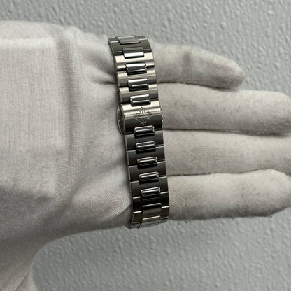 Patek Philippe Lady Nautilus 35.2mm Silver Opaline Dial Watch Ref# 7118/1A-010 - Happy Jewelers Fine Jewelry Lifetime Warranty