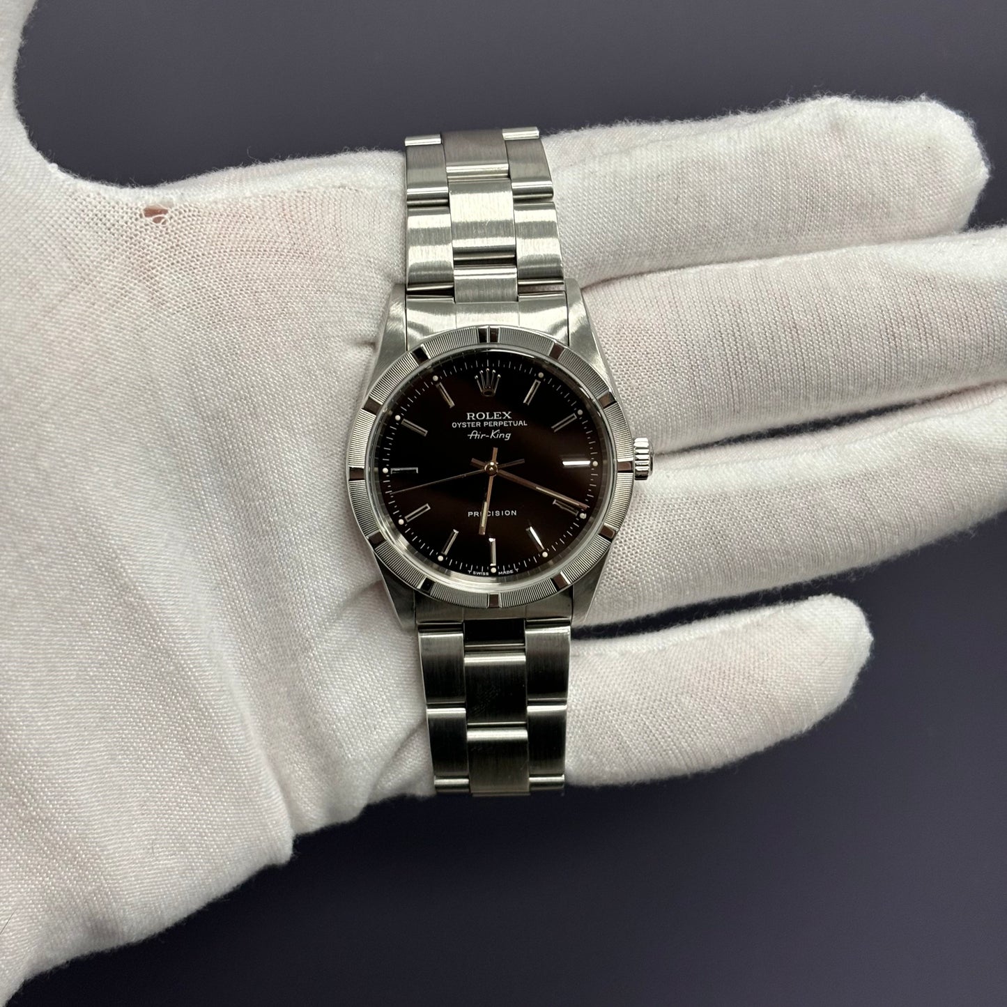 used Rolex Air King 14010 Black Stick Dial and A Stainless Steel Engine Turned Bezel Certified Pre Owned Men s Size 34 mm