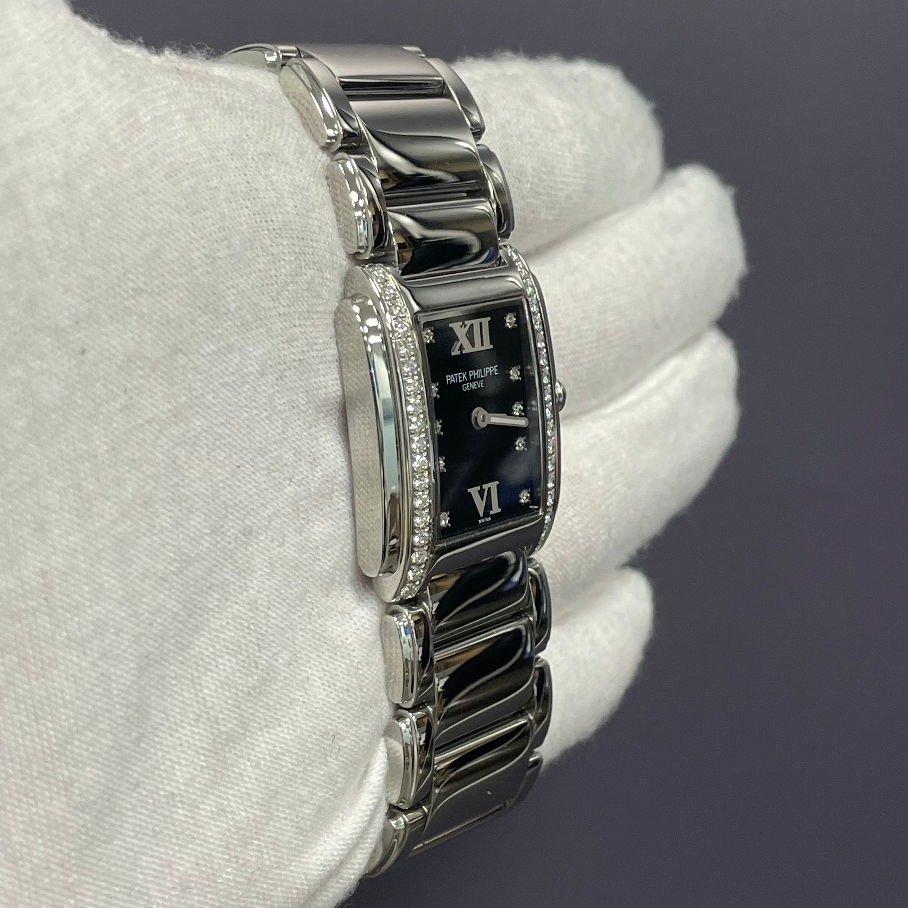 Patek Philippe Twenty-4 25mm Black Dial Watch Ref# 4910/10A-001 - Happy Jewelers Fine Jewelry Lifetime Warranty