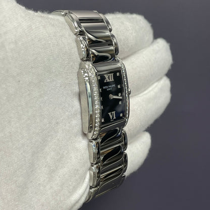 Patek Philippe Twenty-4 25mm Black Dial Watch Ref# 4910/10A-001 - Happy Jewelers Fine Jewelry Lifetime Warranty