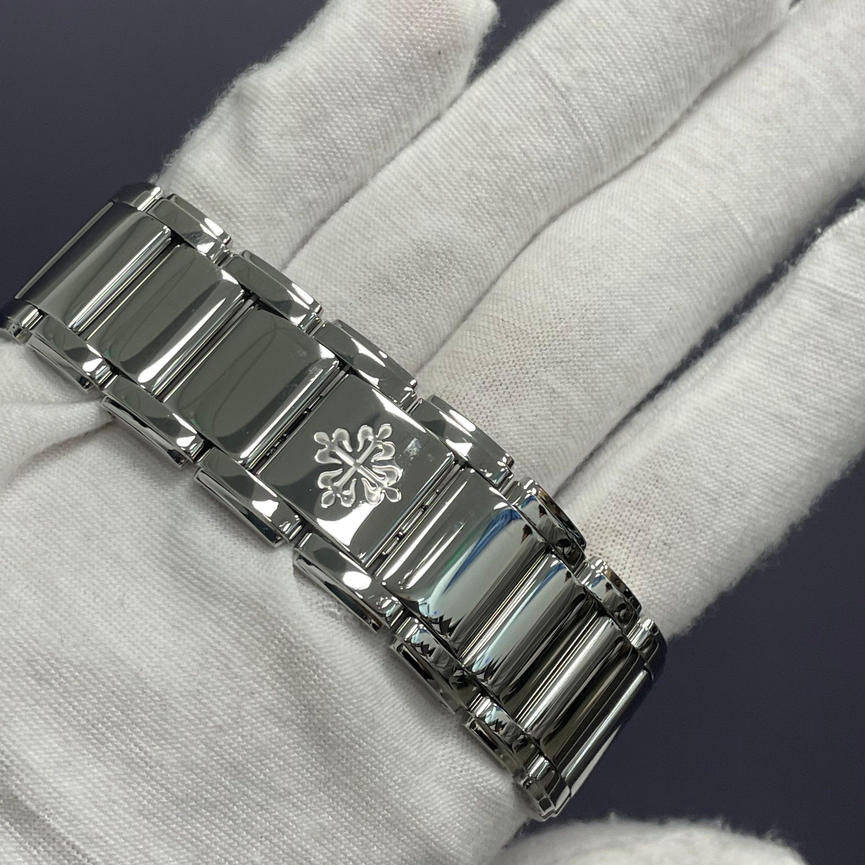 Patek Philippe Twenty-4 25mm Black Dial Watch Ref# 4910/10A-001 - Happy Jewelers Fine Jewelry Lifetime Warranty