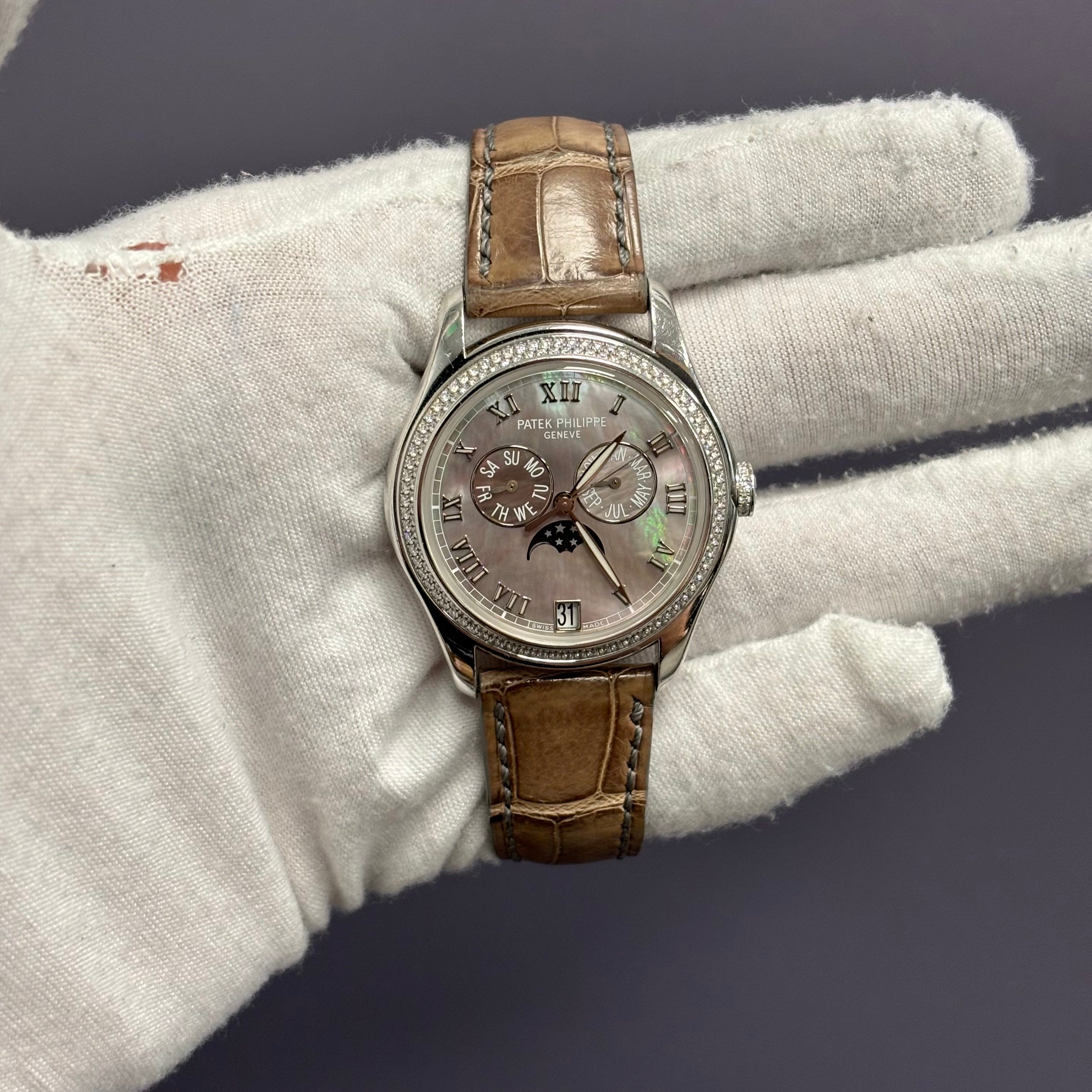 Patek Philippe Annual Calendar 37mm MOP Dial Watch Ref# 4936G-001 - Happy Jewelers Fine Jewelry Lifetime Warranty