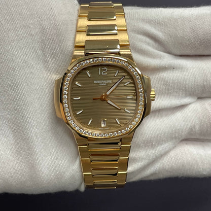 Patek Philippe Nautilus 35mm Champagne Dial Watch Ref# 7118/1200R-010 - Happy Jewelers Fine Jewelry Lifetime Warranty