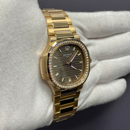 Patek Philippe Nautilus 35mm Champagne Dial Watch Ref# 7118/1200R-010 - Happy Jewelers Fine Jewelry Lifetime Warranty