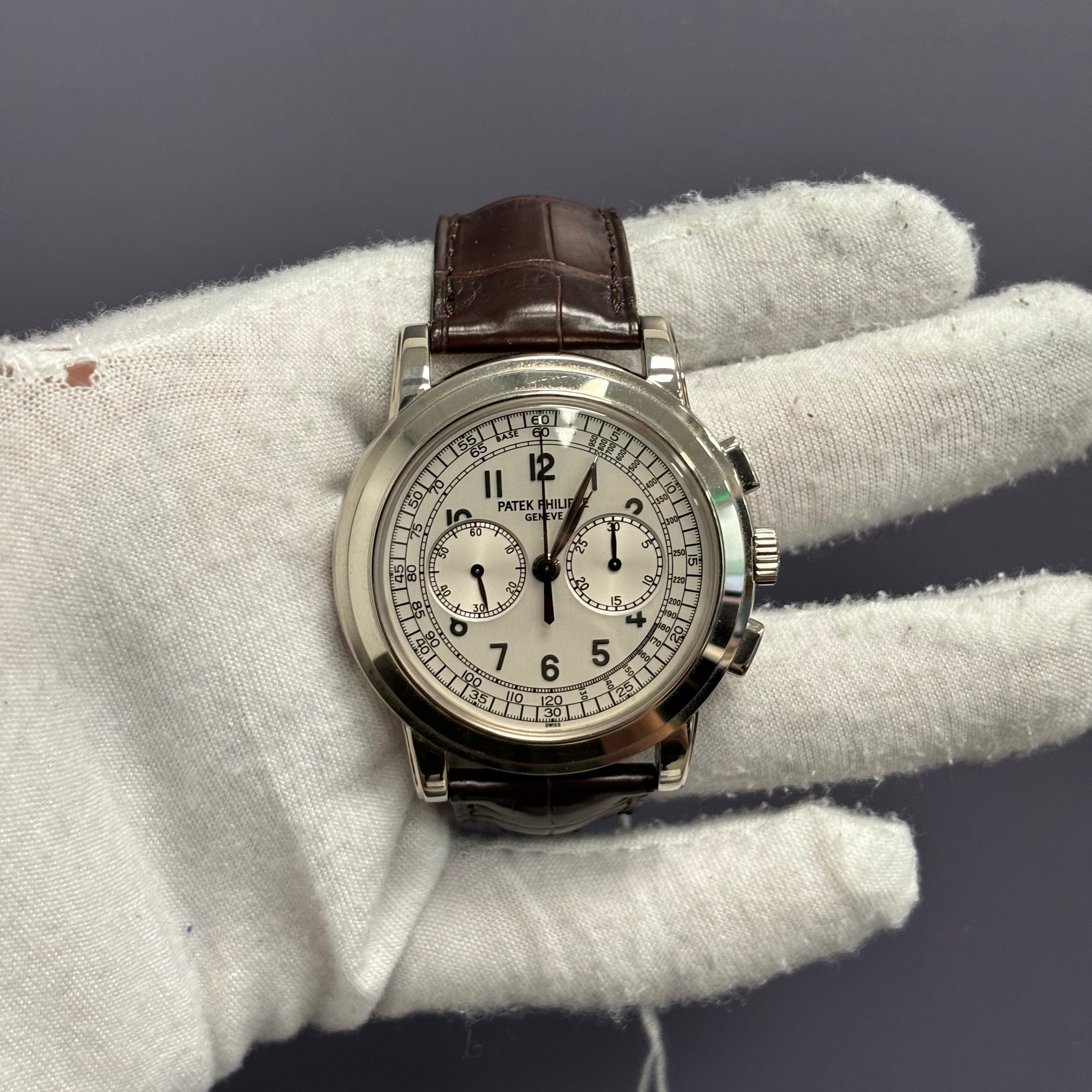 Patek Philippe Chronograph 42mm White Dial Watch Ref# 5070G-001 - Happy Jewelers Fine Jewelry Lifetime Warranty