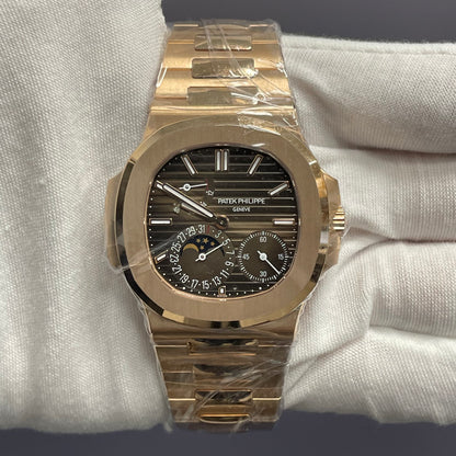 Patek Philippe Nautilus 40.5mm Brown Dial Watch Ref# 5712/1R-001 - Happy Jewelers Fine Jewelry Lifetime Warranty